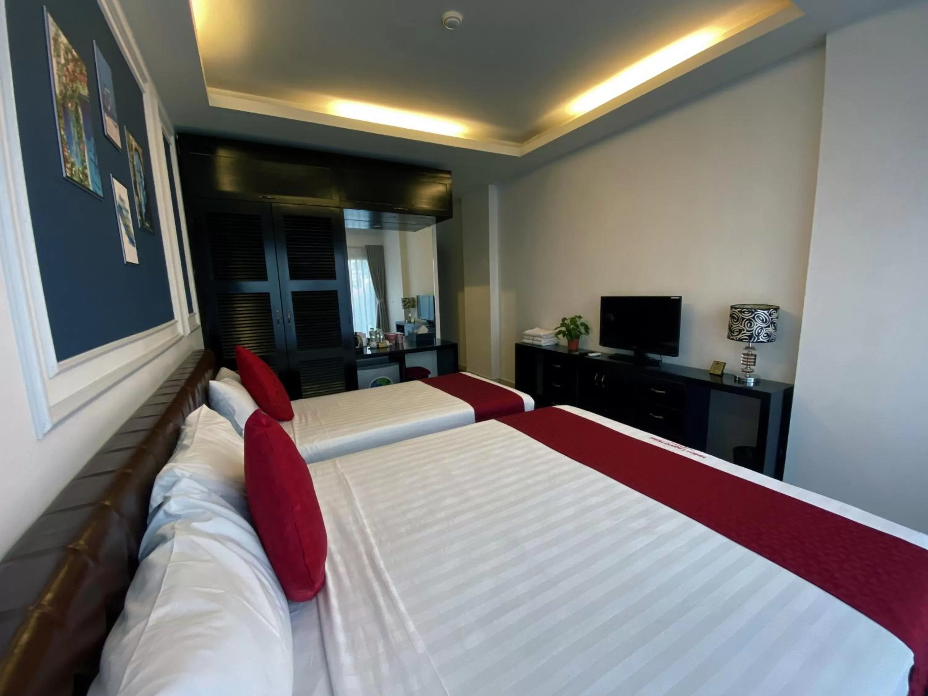 Bed in Eclipse Legend Hotel