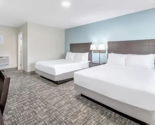 Bed in Top Notch Inn