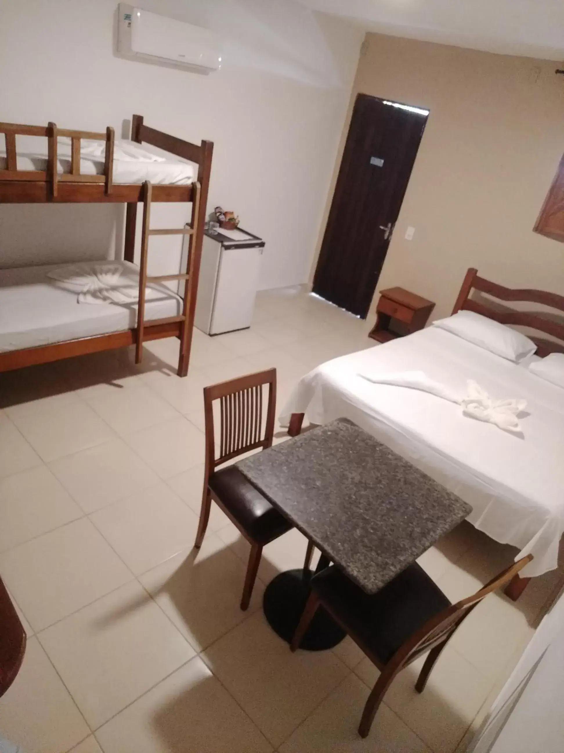 Quadruple Room with Garden View in Pousada Ponta Mar Quadruple Room with Garden View in Pousada Ponta Mar