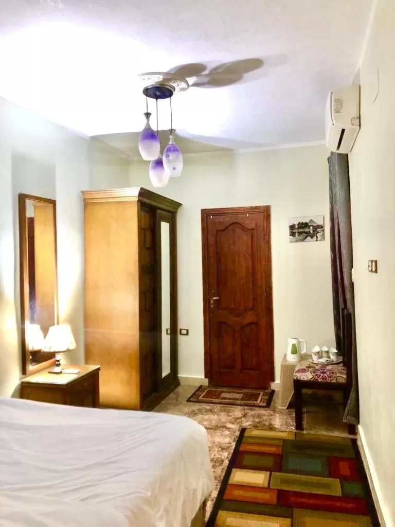 TV/Entertainment Center in Sphinx palace pyramids view