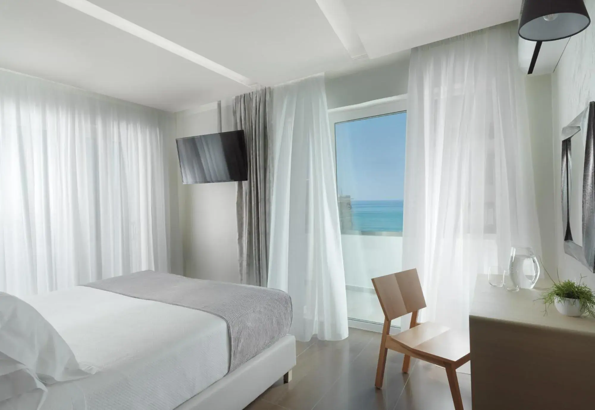 Deluxe Suite with Partial Sea View in Melrose Rethymno by Mage Hotels Deluxe Suite with Partial Sea View in Melrose Rethymno by Mage Hotels