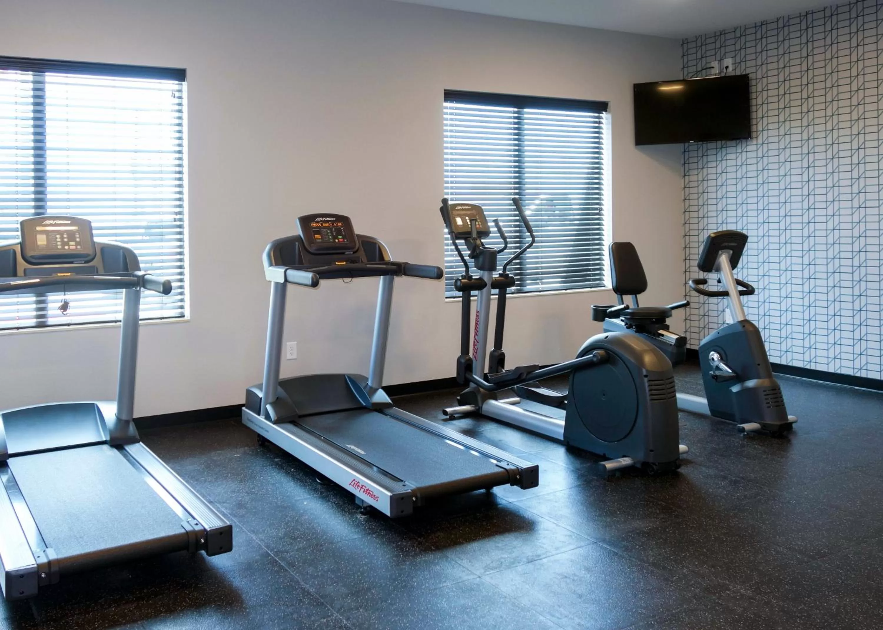 Fitness centre/facilities in Country Inn & Suites by Radisson, New Braunfels, TX