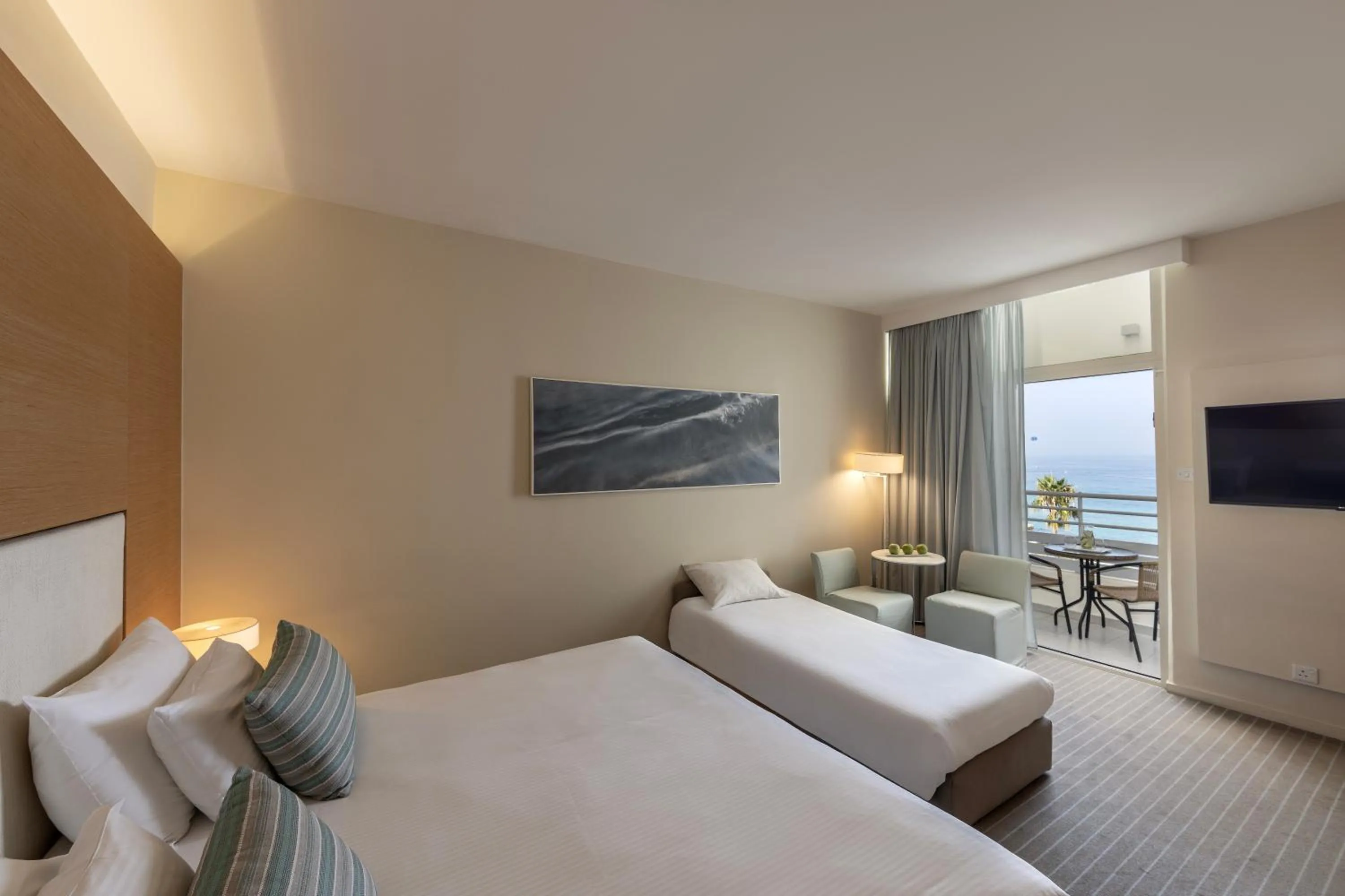 Bed in Capo Bay Hotel