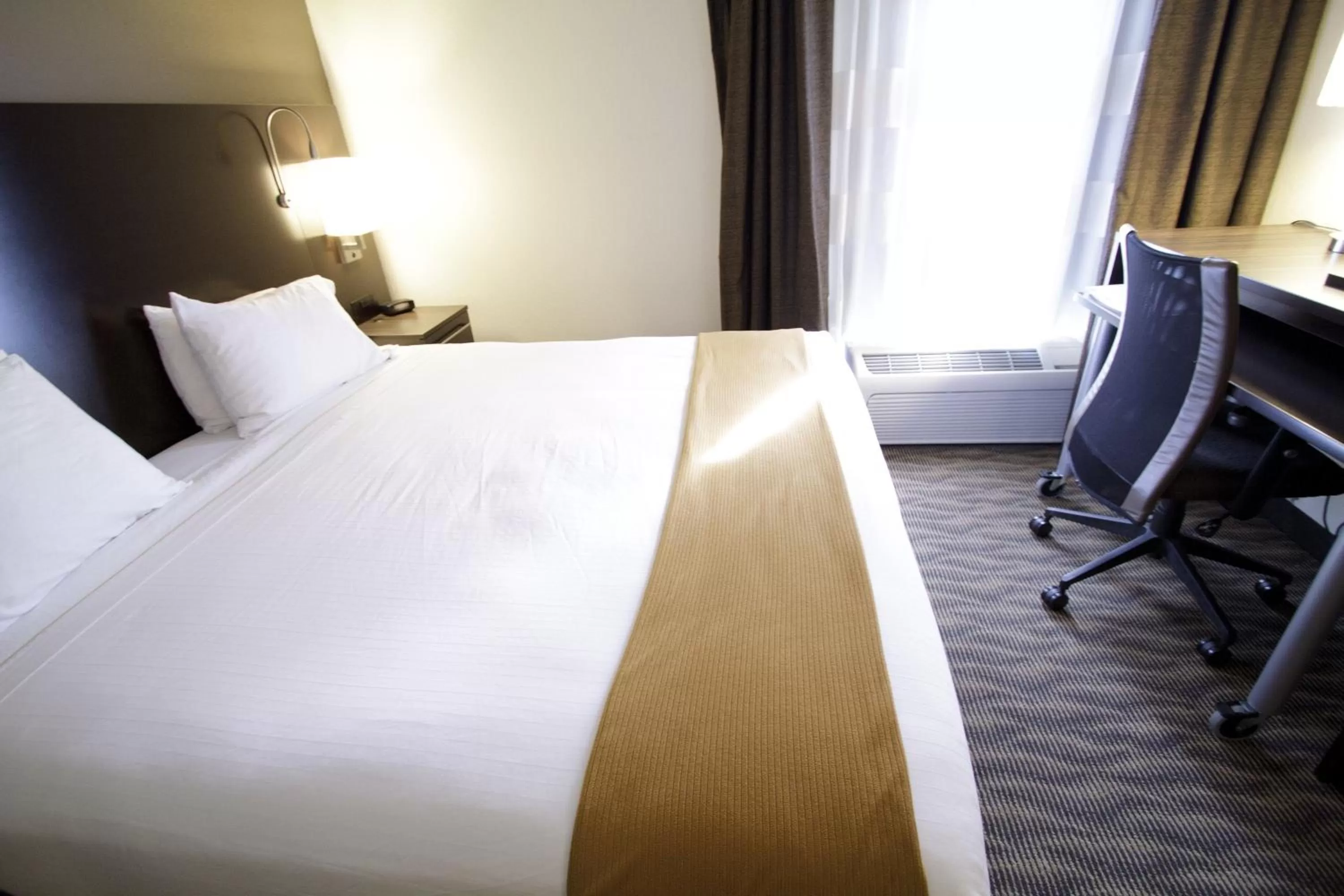 Bed in Holiday Inn Express Hotel & Suites Colby by IHG