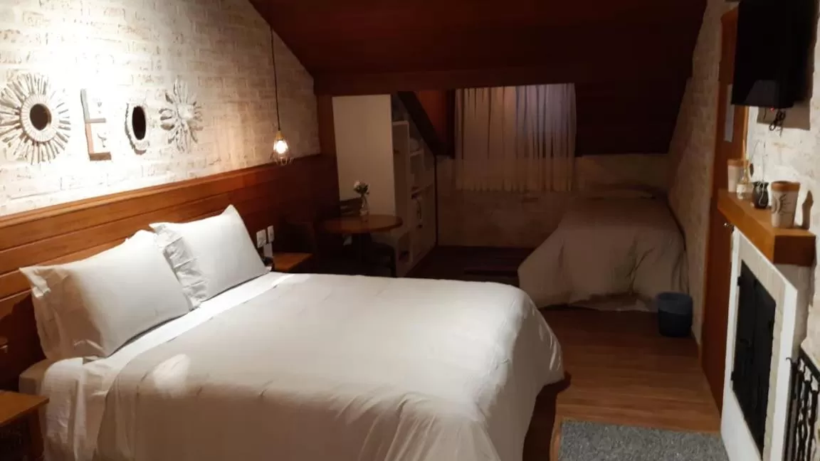 Bed in Pousada Toca Da Coruja