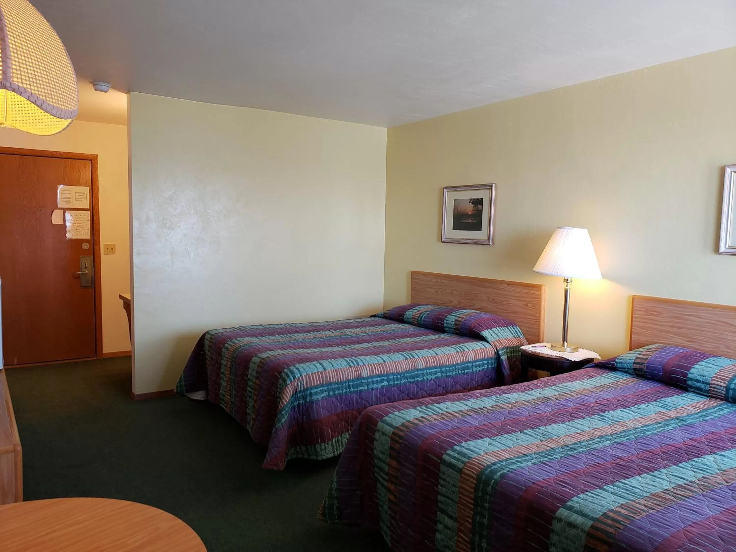 Bed in Algoma Beach Motel