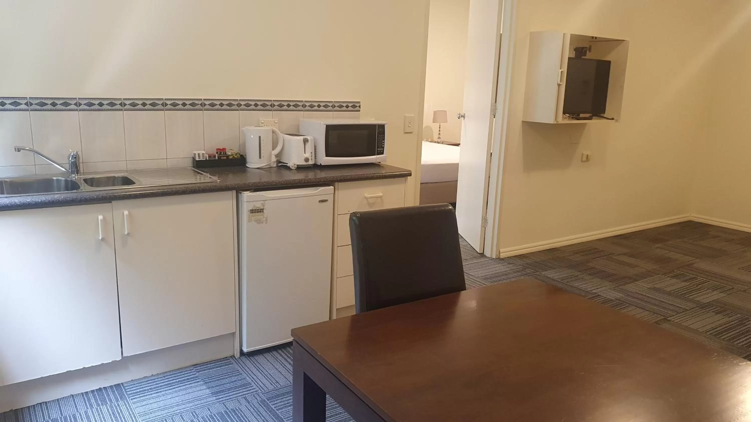 Kitchen or kitchenette in Hotel Cavalier