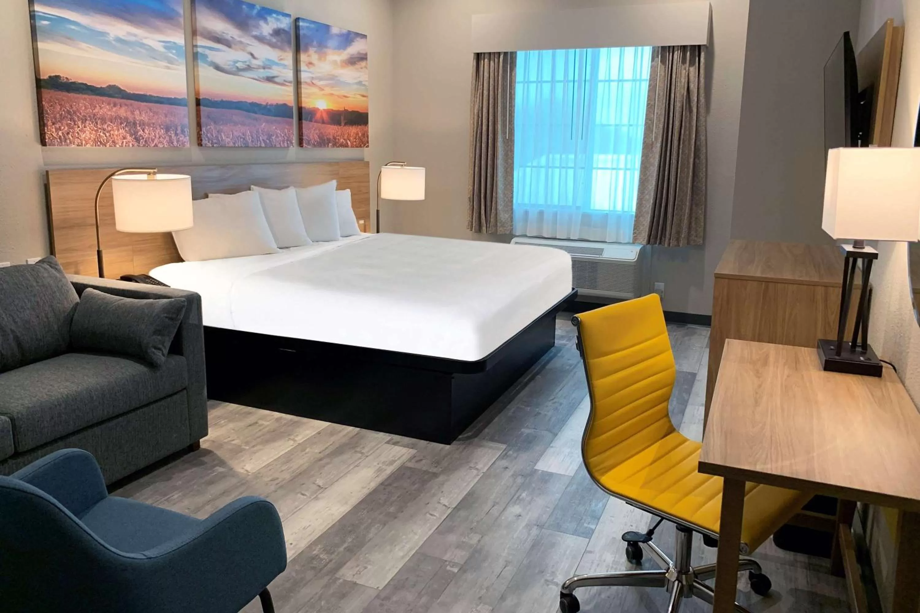 Photo of the whole room, Bed in Days Inn & Suites by Wyndham Greater Tomball