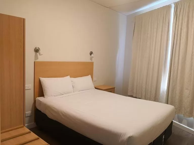 Bed in Dandenong Motel