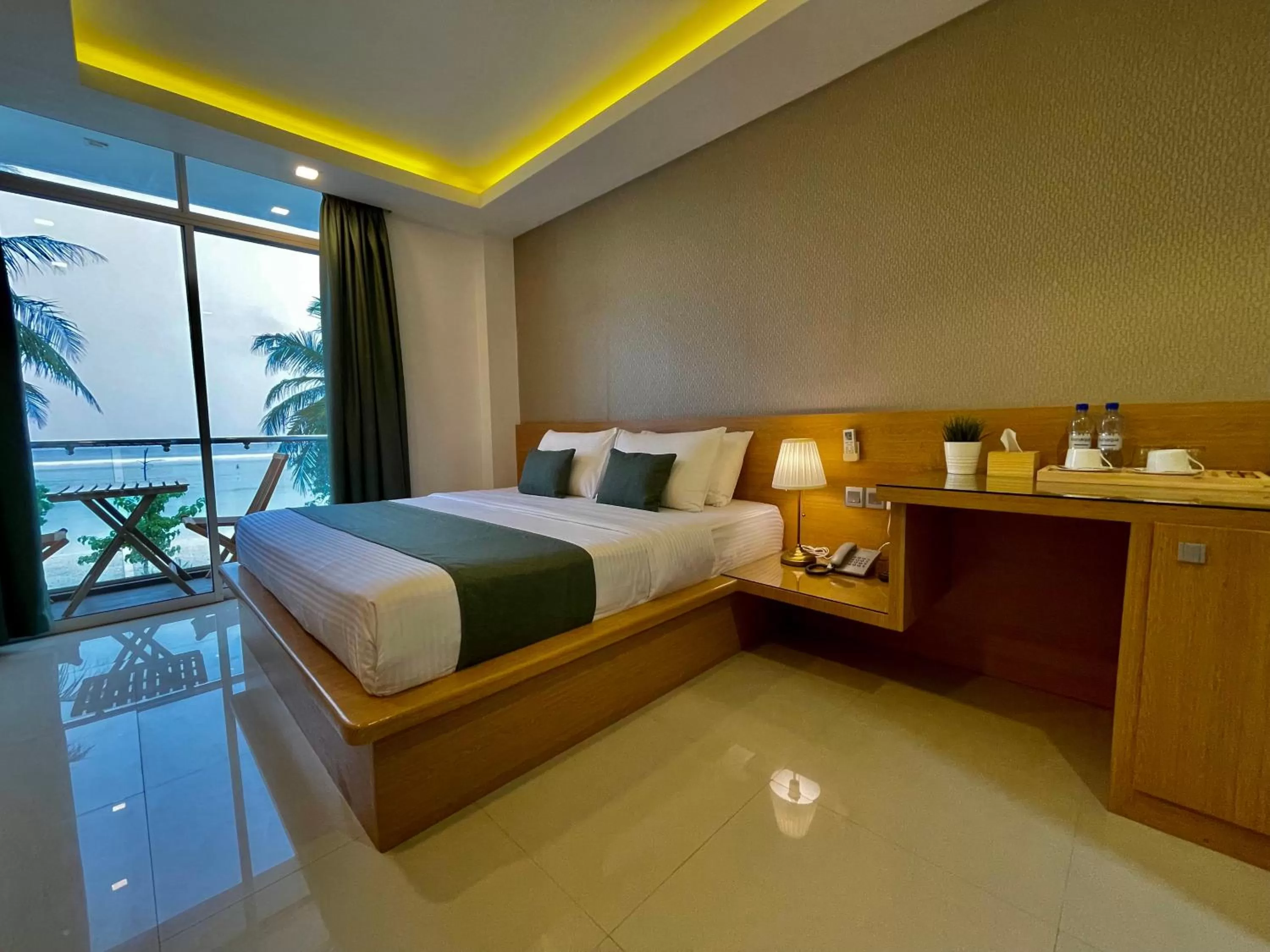 Photo of the whole room, Bed in Huvan Beach Hotel at Hulhumale
