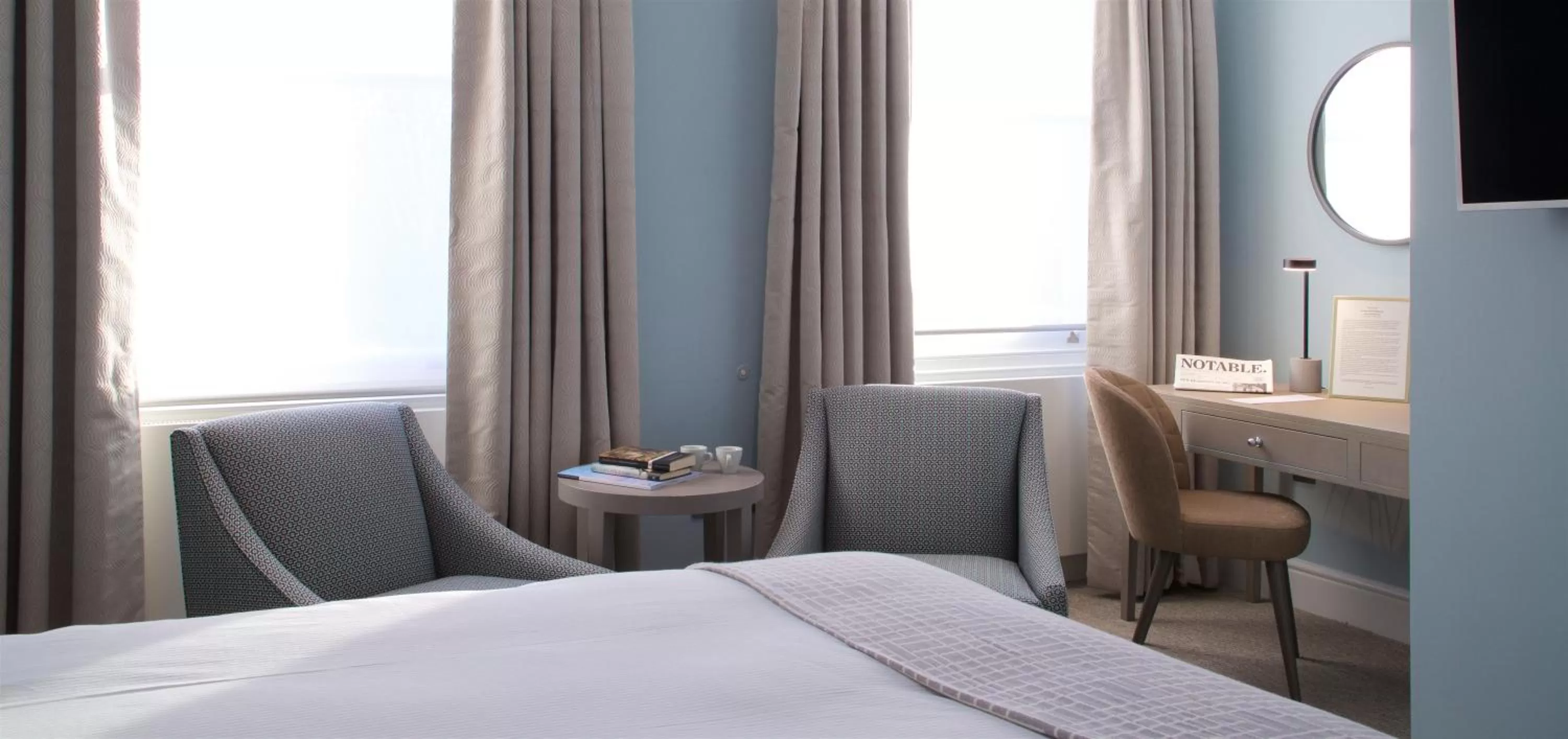 Bed in 54 Queen's Gate Hotel