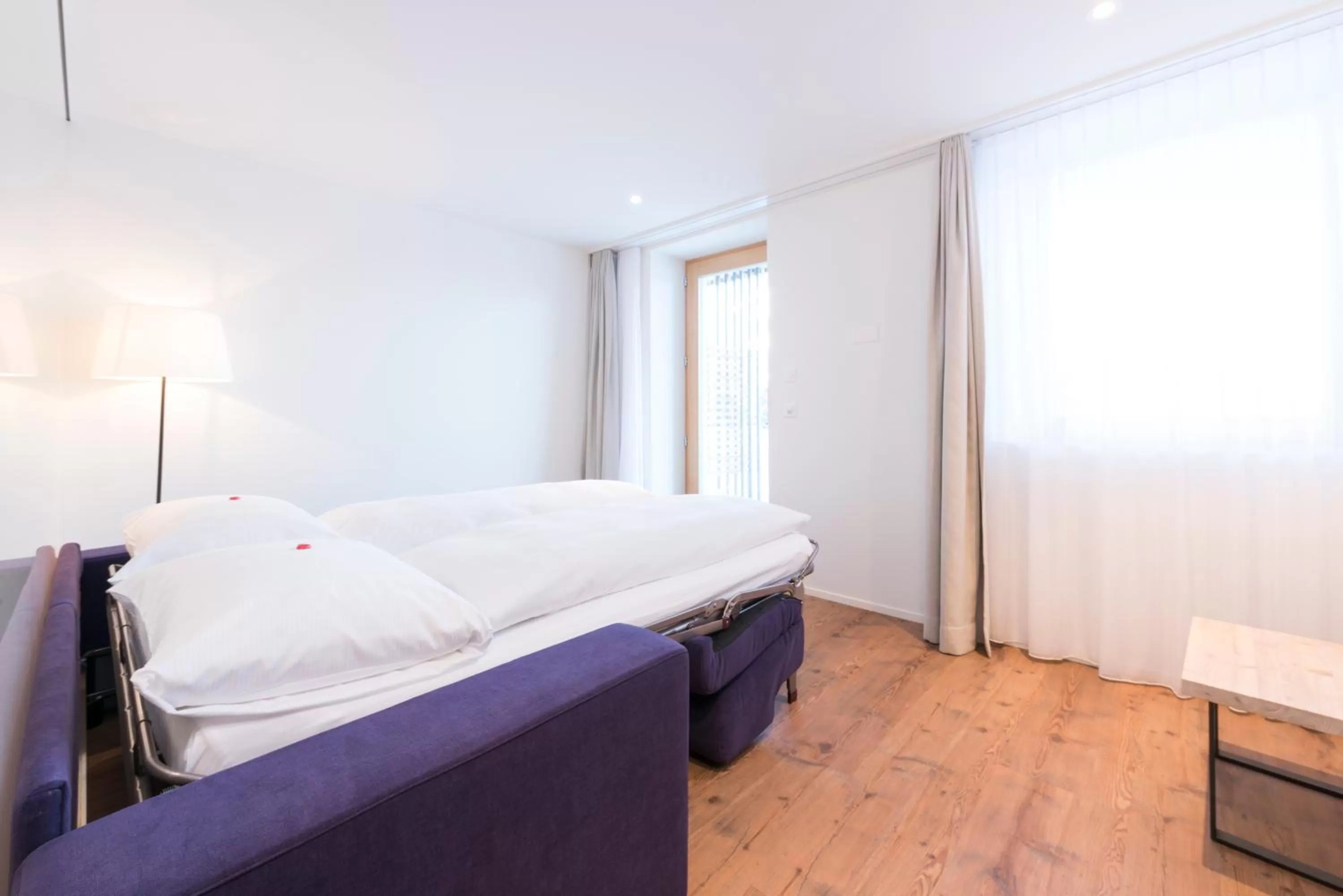 Photo of the whole room, Bed in Randolins Familienresort