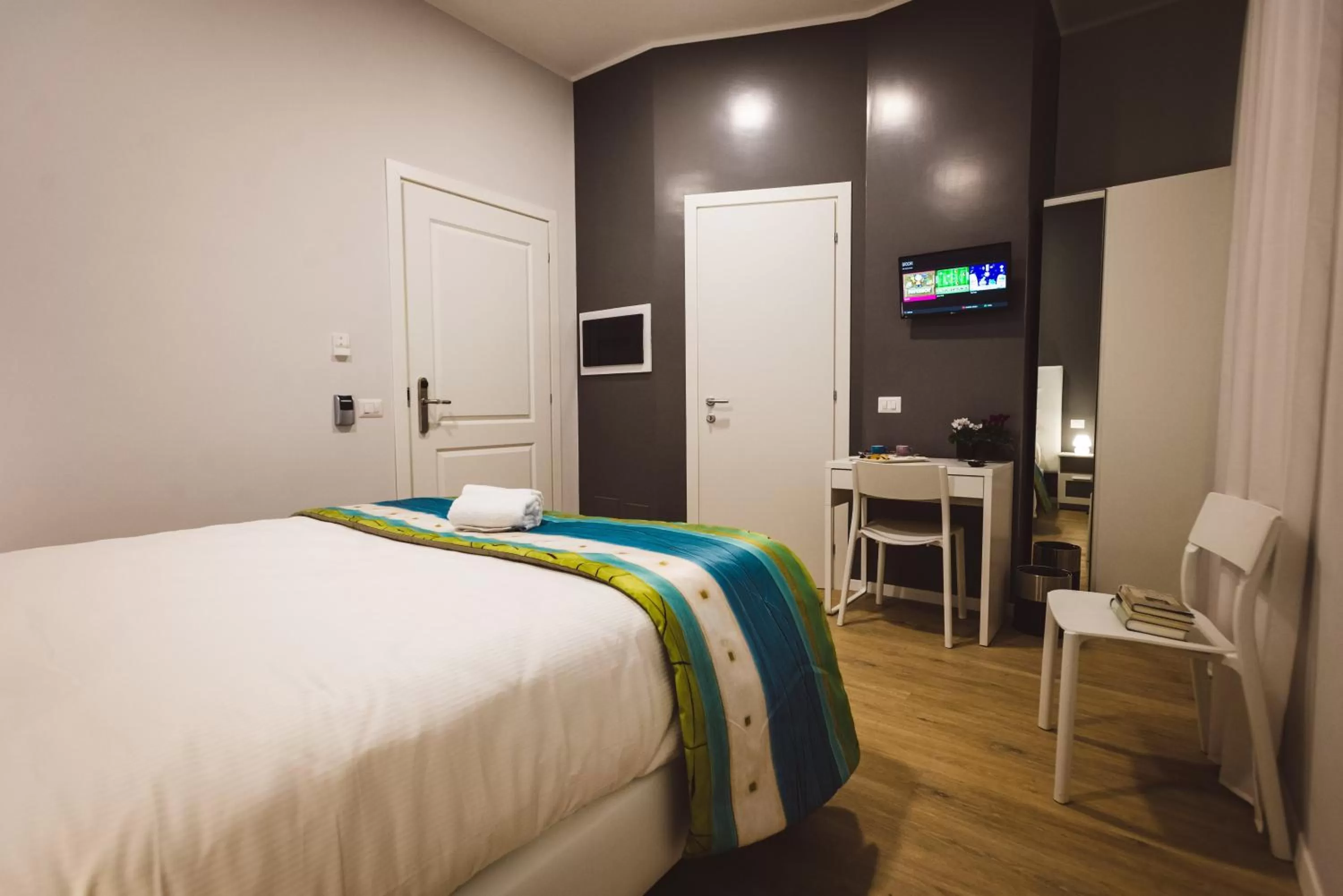 Bed in Angelina Rooms in Rome