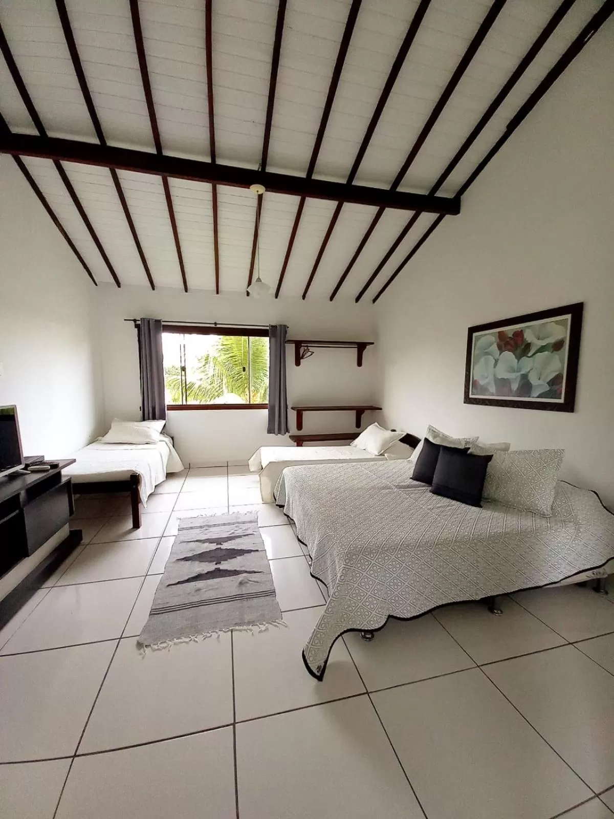 Bed in Pousada Recanto Das Emerências