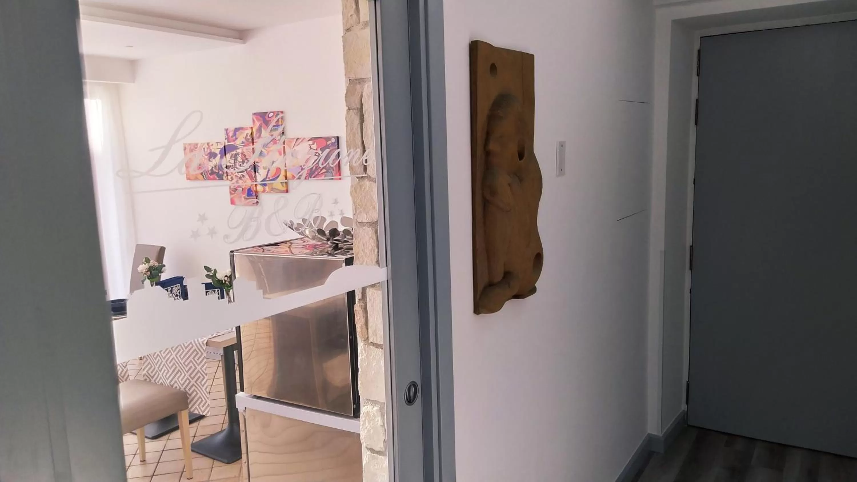 Communal lounge/ TV room in B&B La Stazione