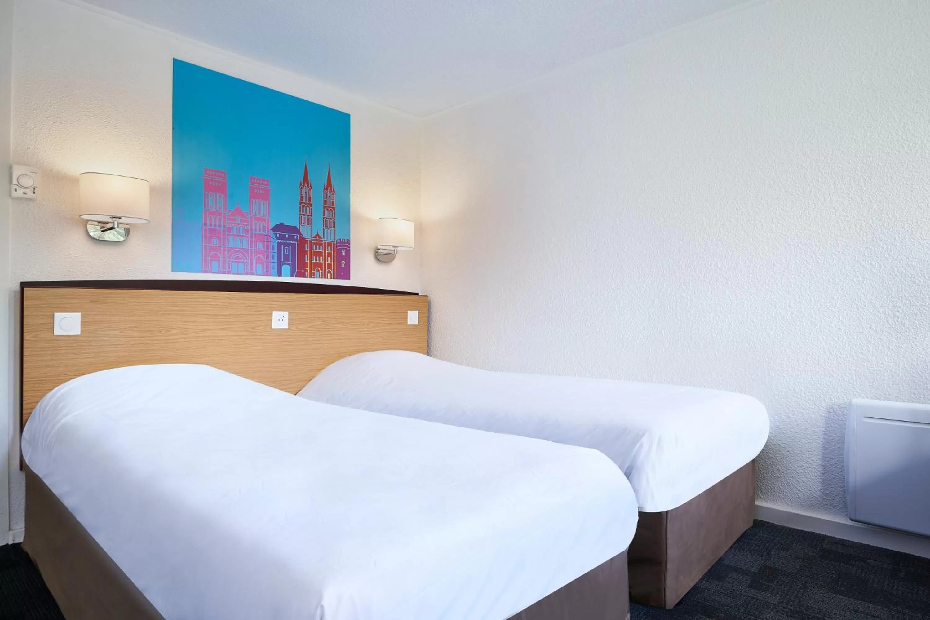 Bedroom in Kyriad Direct Evreux