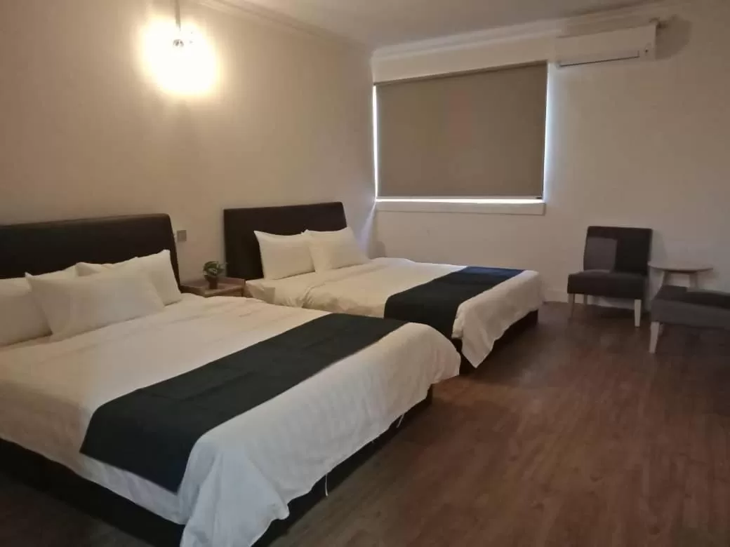 Bed in Star Seasons Hotel