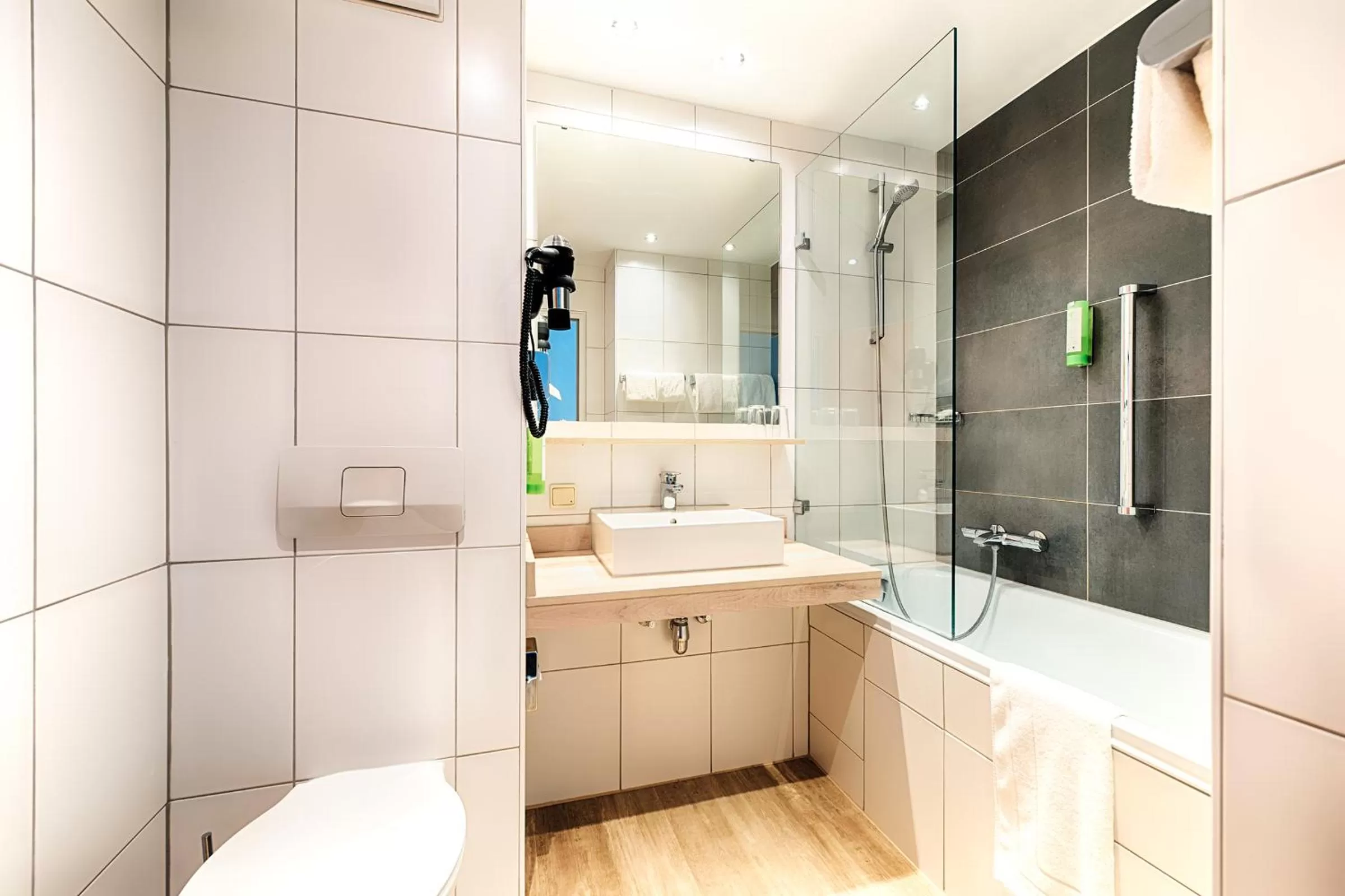 Bathroom in Holiday Inn Munich - South by IHG