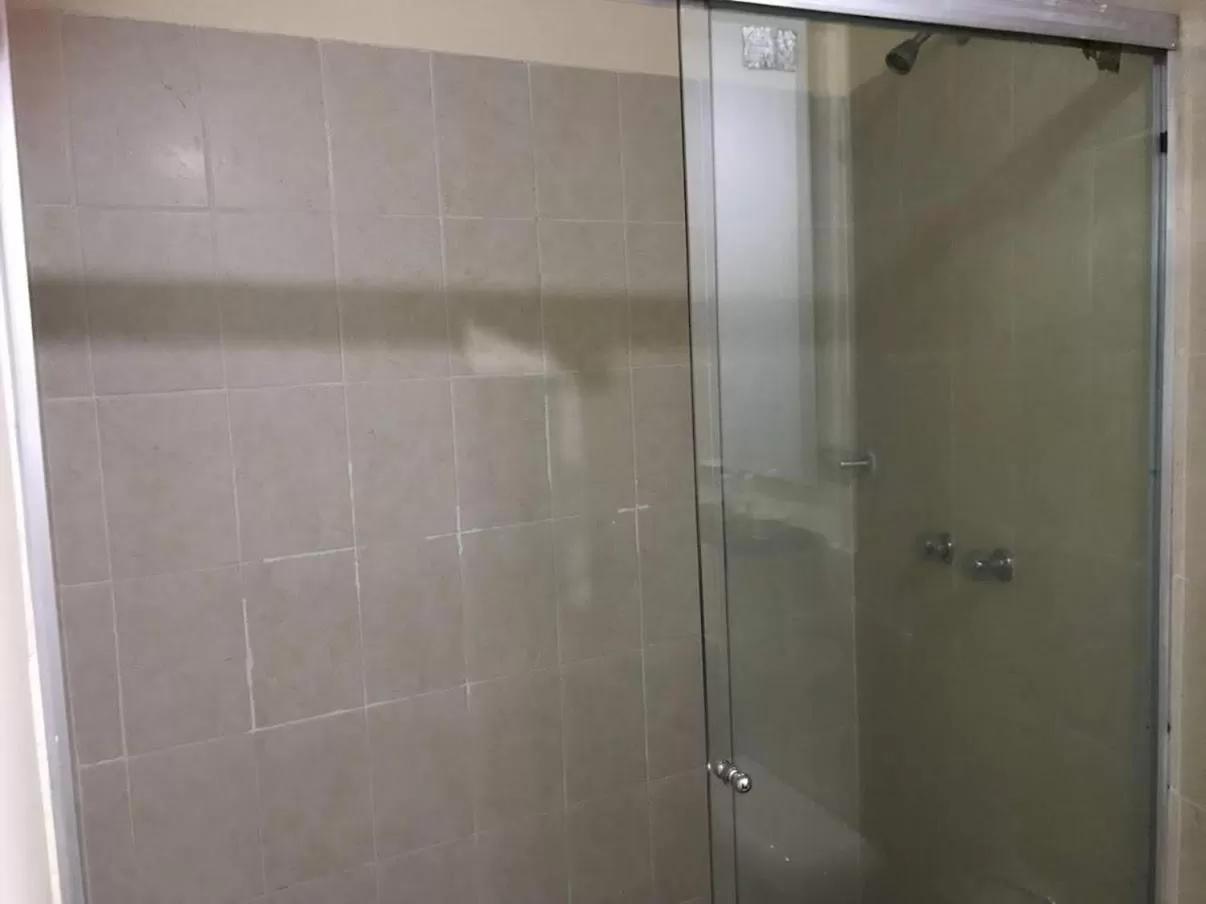 Shower in Arco Apartasuites