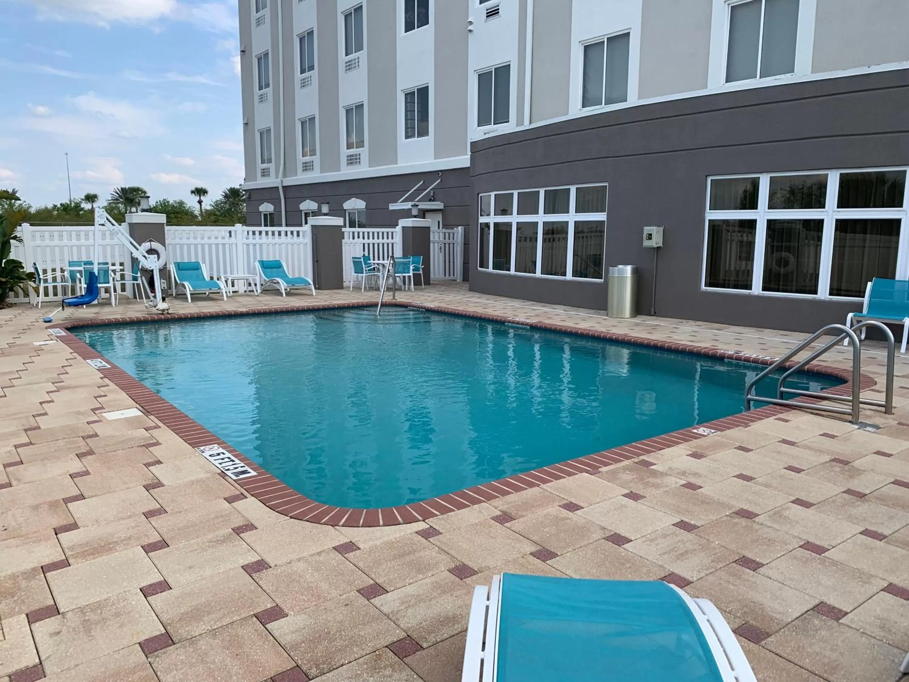 Swimming pool in Holiday Inn Express Orlando - South Davenport by IHG