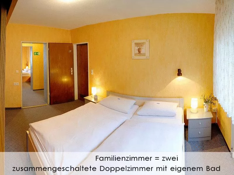 Photo of the whole room, Bed in Hotel Keinath Stuttgart