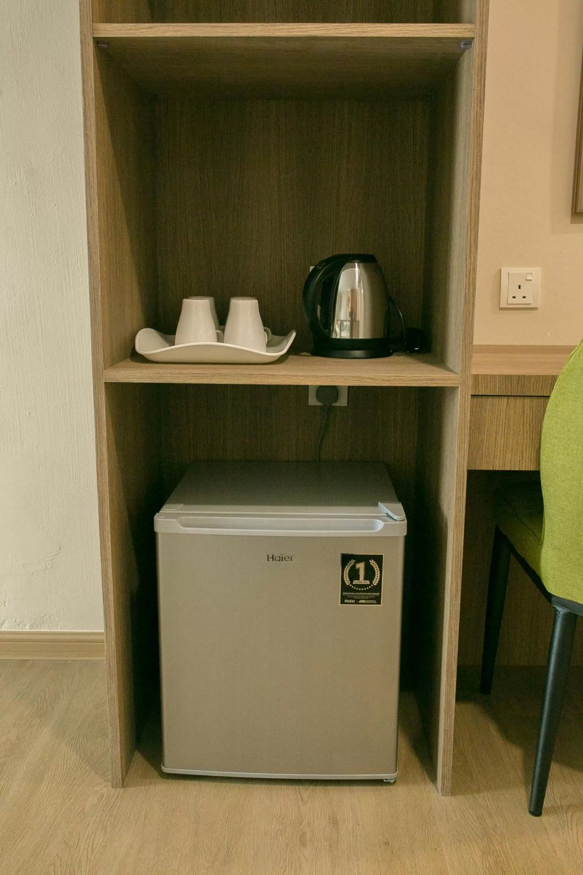 Kitchen or kitchenette, TV/Entertainment Center in Savana Hotel & Serviced Apartments