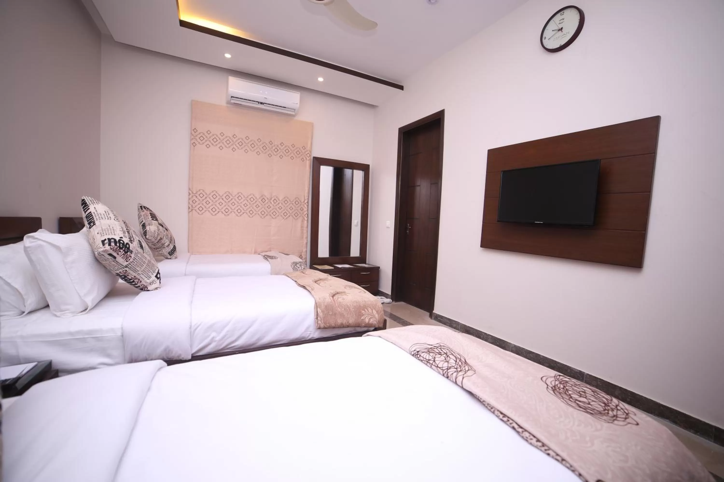 Bed in Zifan Hotel & Suites