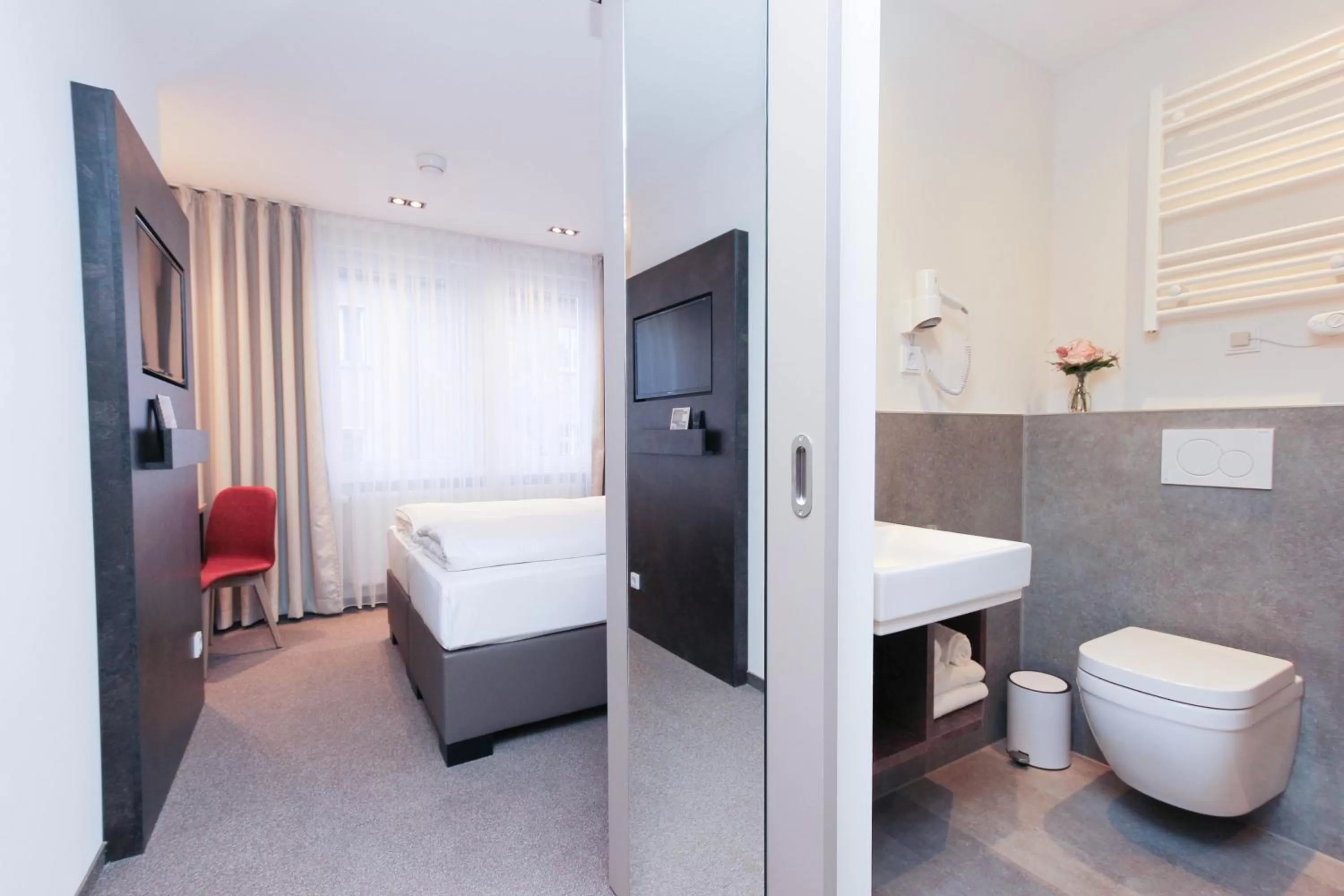 Bed in City Hotel Würzburg