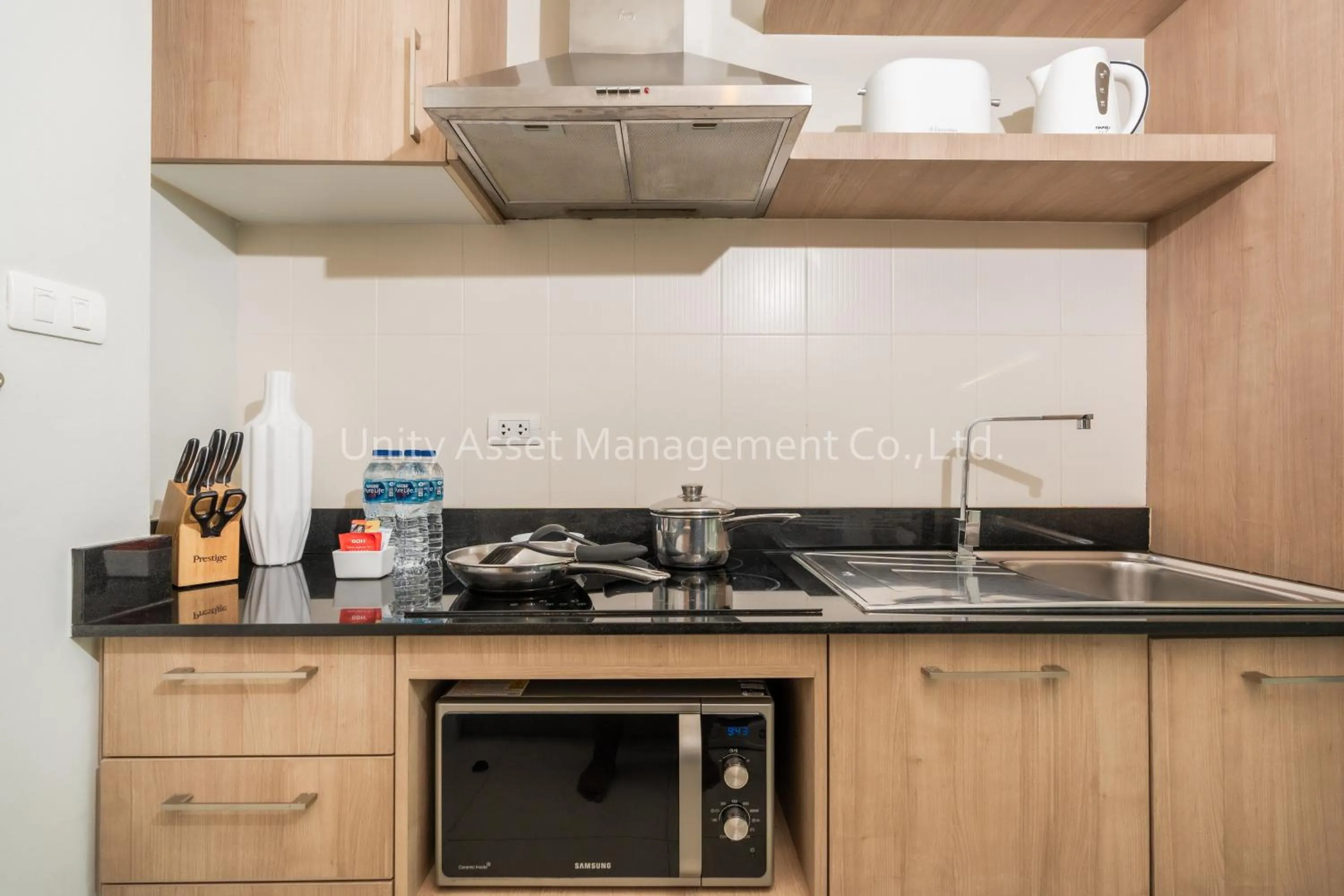 Kitchen or kitchenette in The Unity and The Bliss Patong Residence