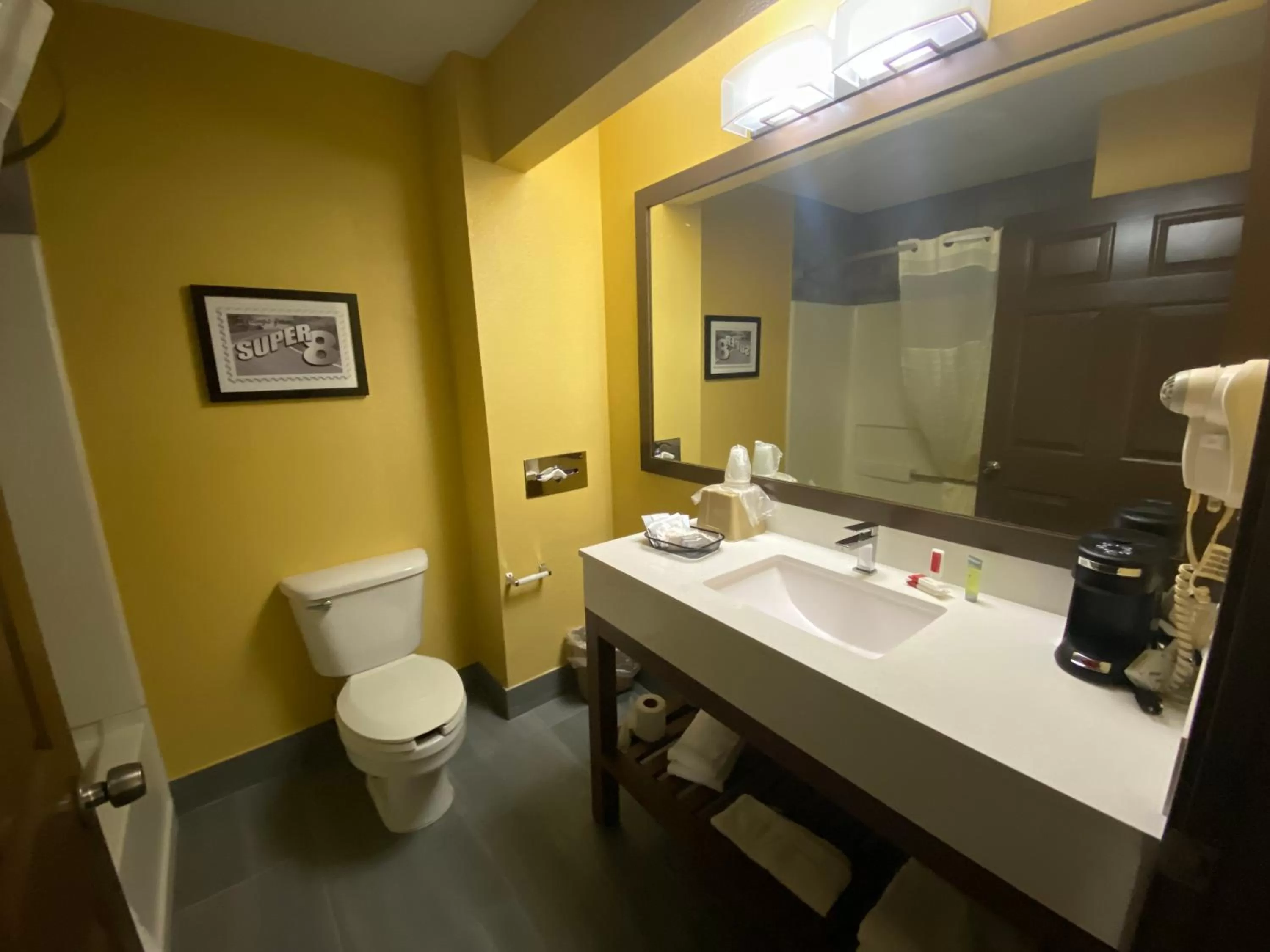 Bathroom in Super 8 by Wyndham Olive Branch