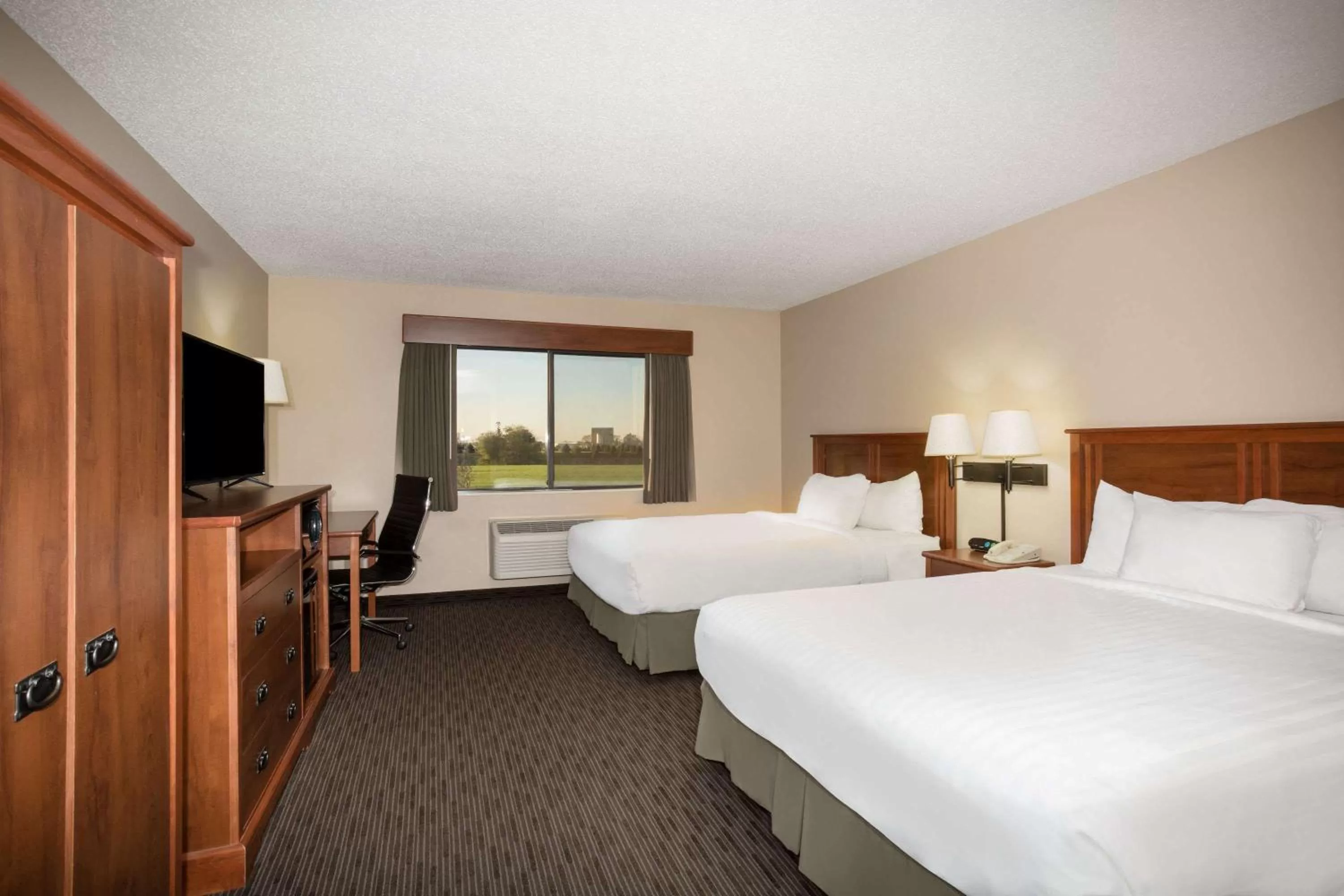 Photo of the whole room, Bed in AmericInn by Wyndham Sioux City