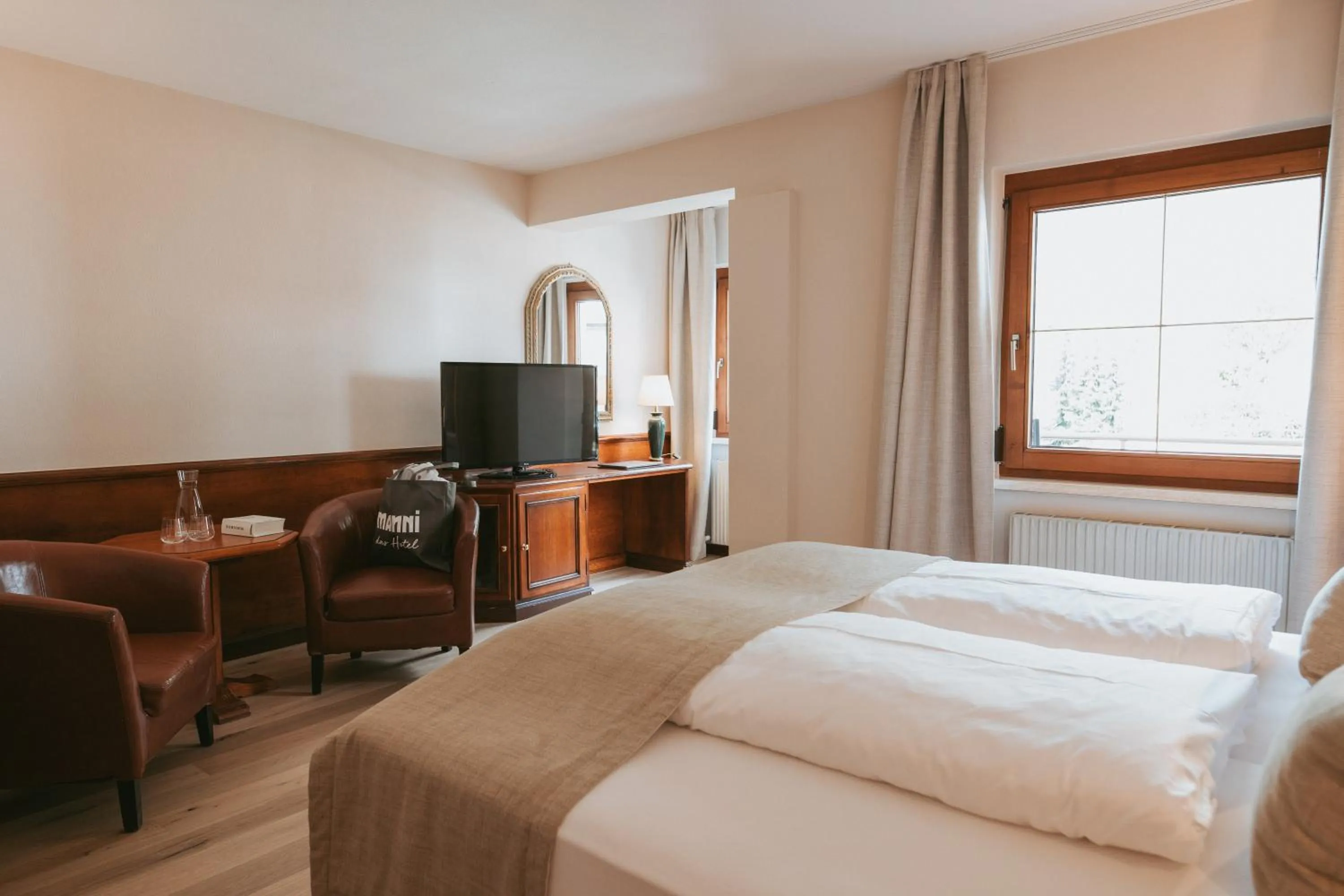 Photo of the whole room, Bed in MANNI das Hotel