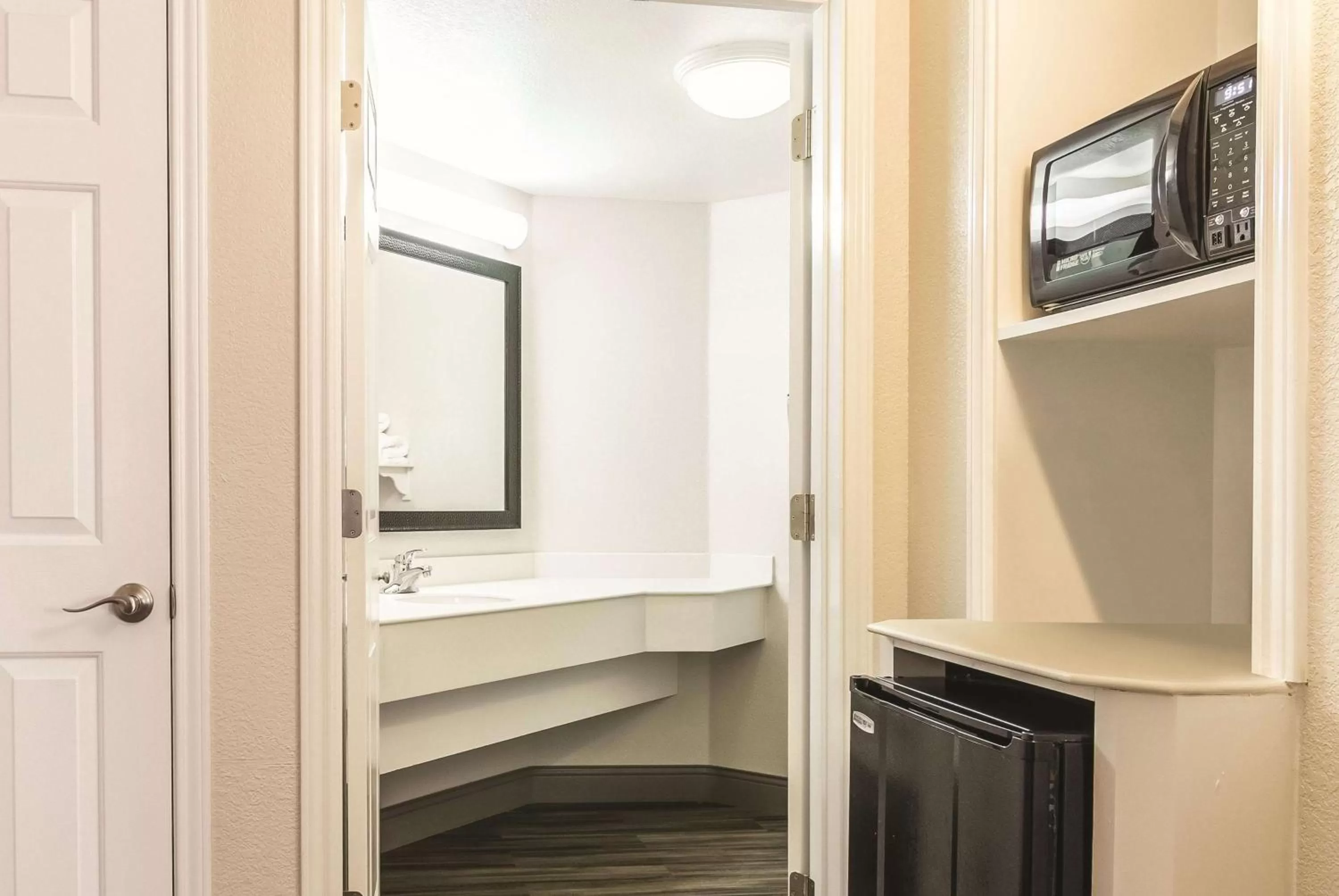 Photo of the whole room in La Quinta by Wyndham Orlando Airport North - Free Airport Shuttle!