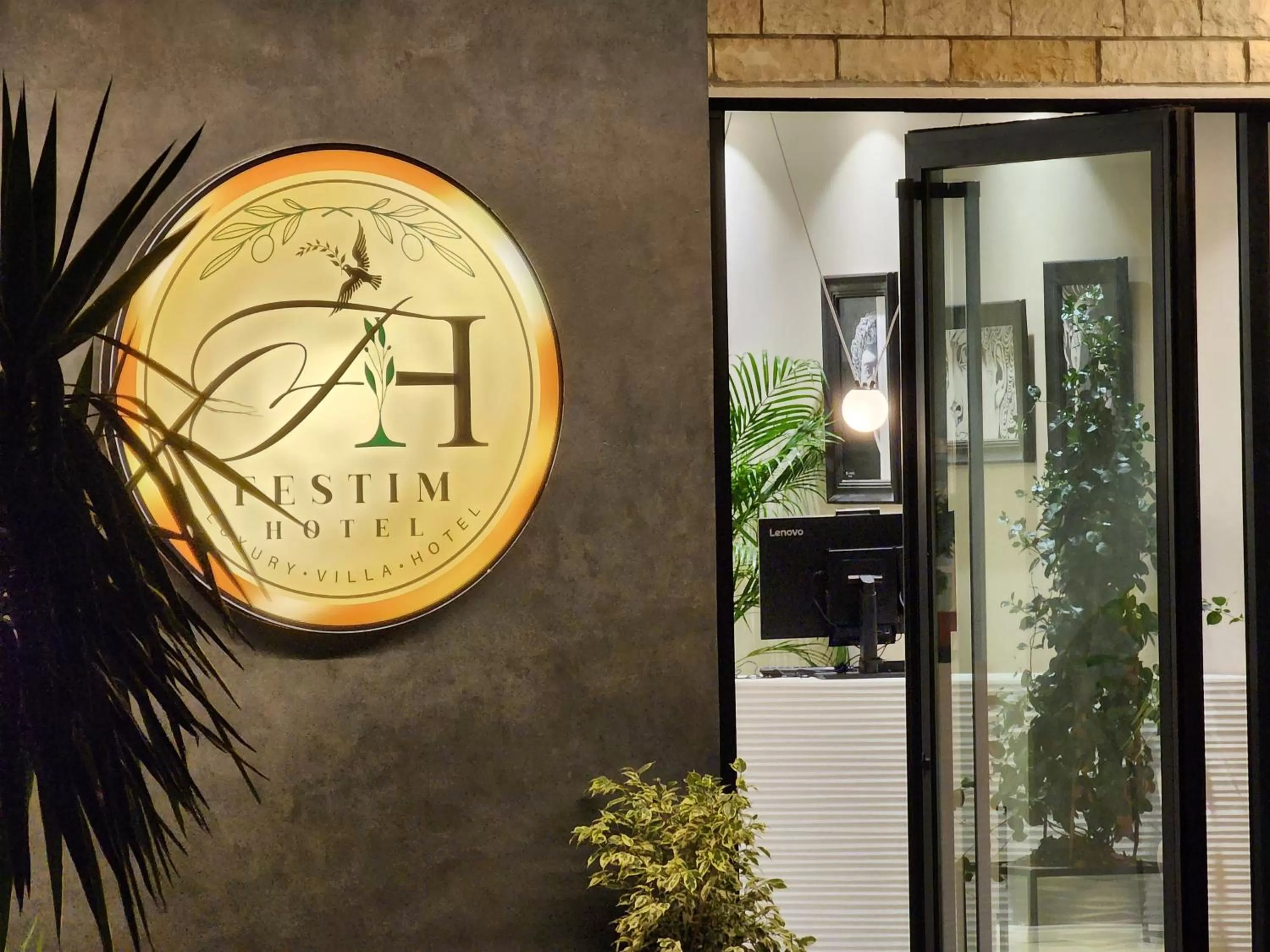 Property logo or sign in Festim Villa Hotel