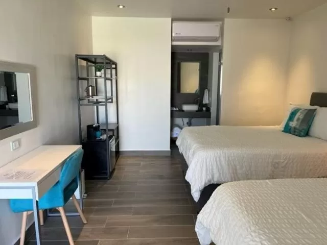 Bed in The Cove Boutique Hotel Adults Only