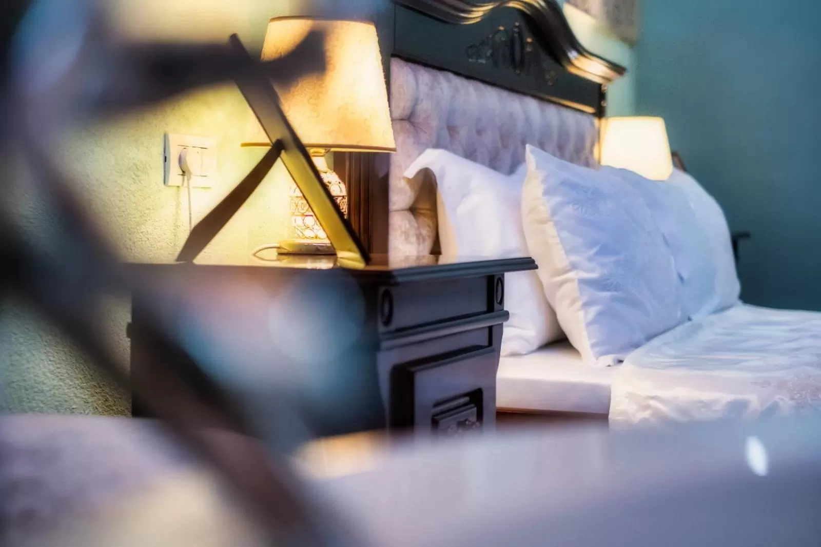 Decorative detail, Bed in JMR Royal -Luxury Rooms & Private Sauna