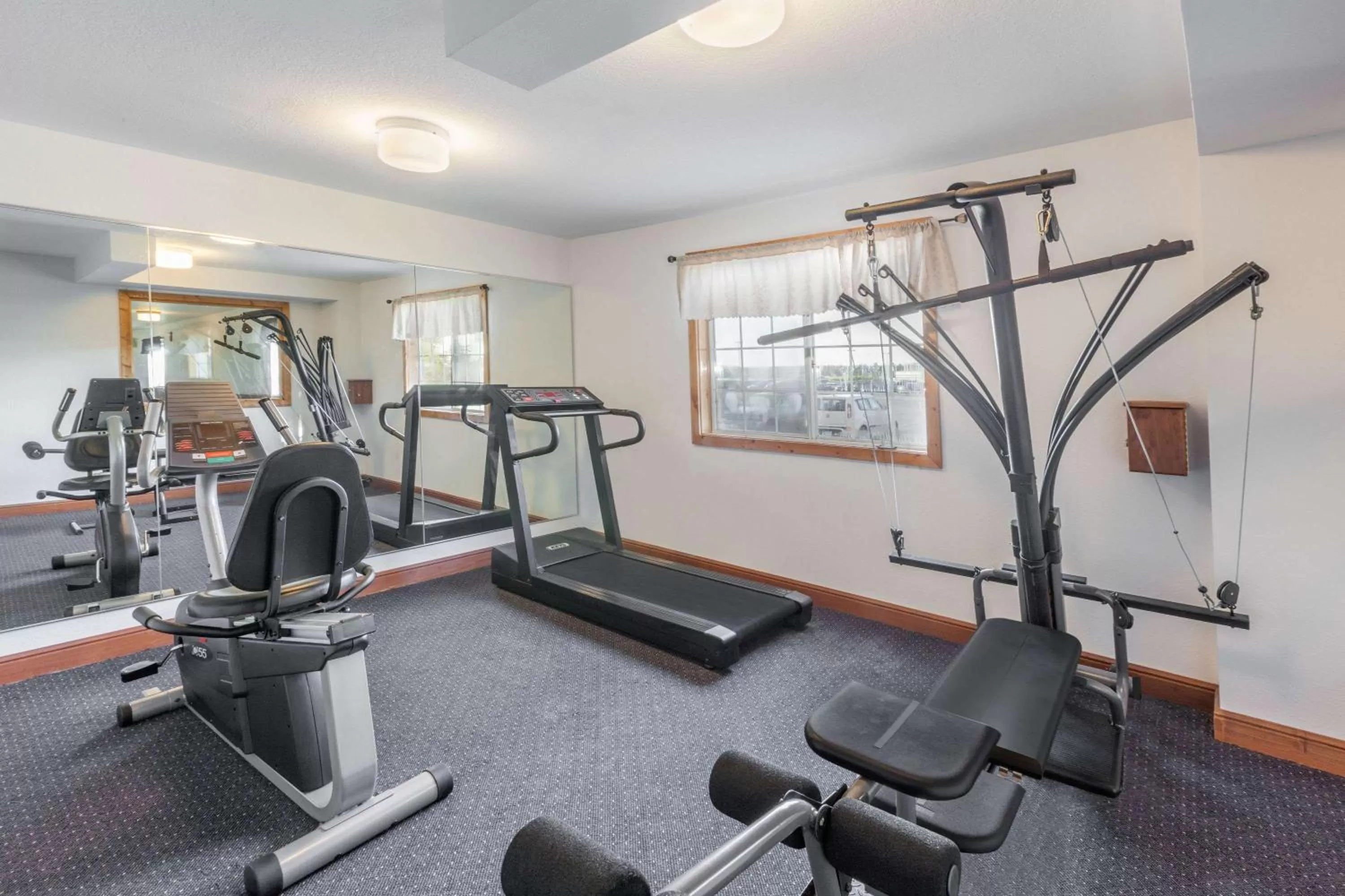 Fitness centre/facilities in Ramada by Wyndham Mackinaw City Waterfront