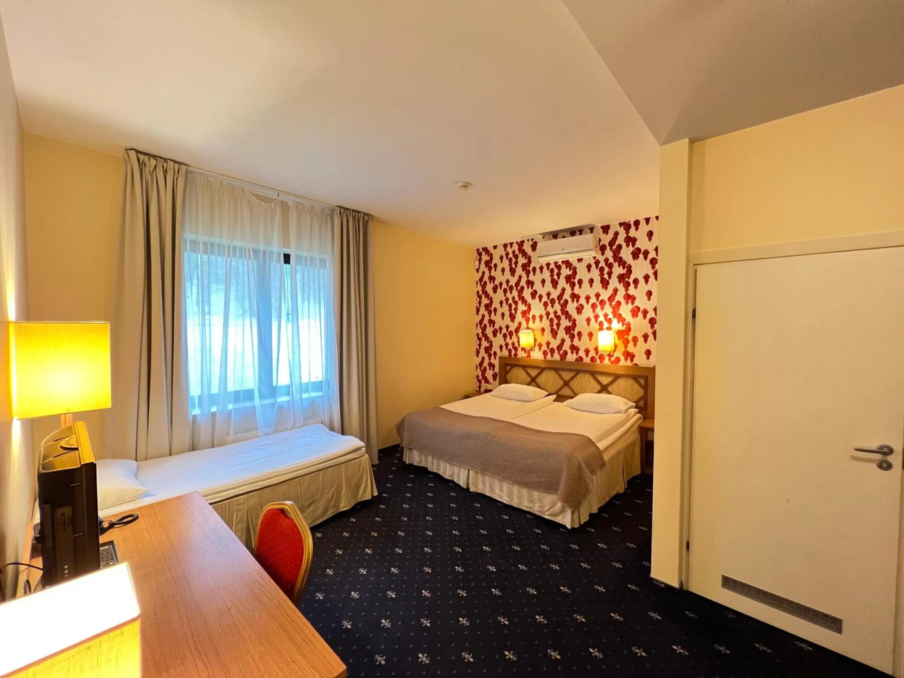 Bed in Park Villa Hotel