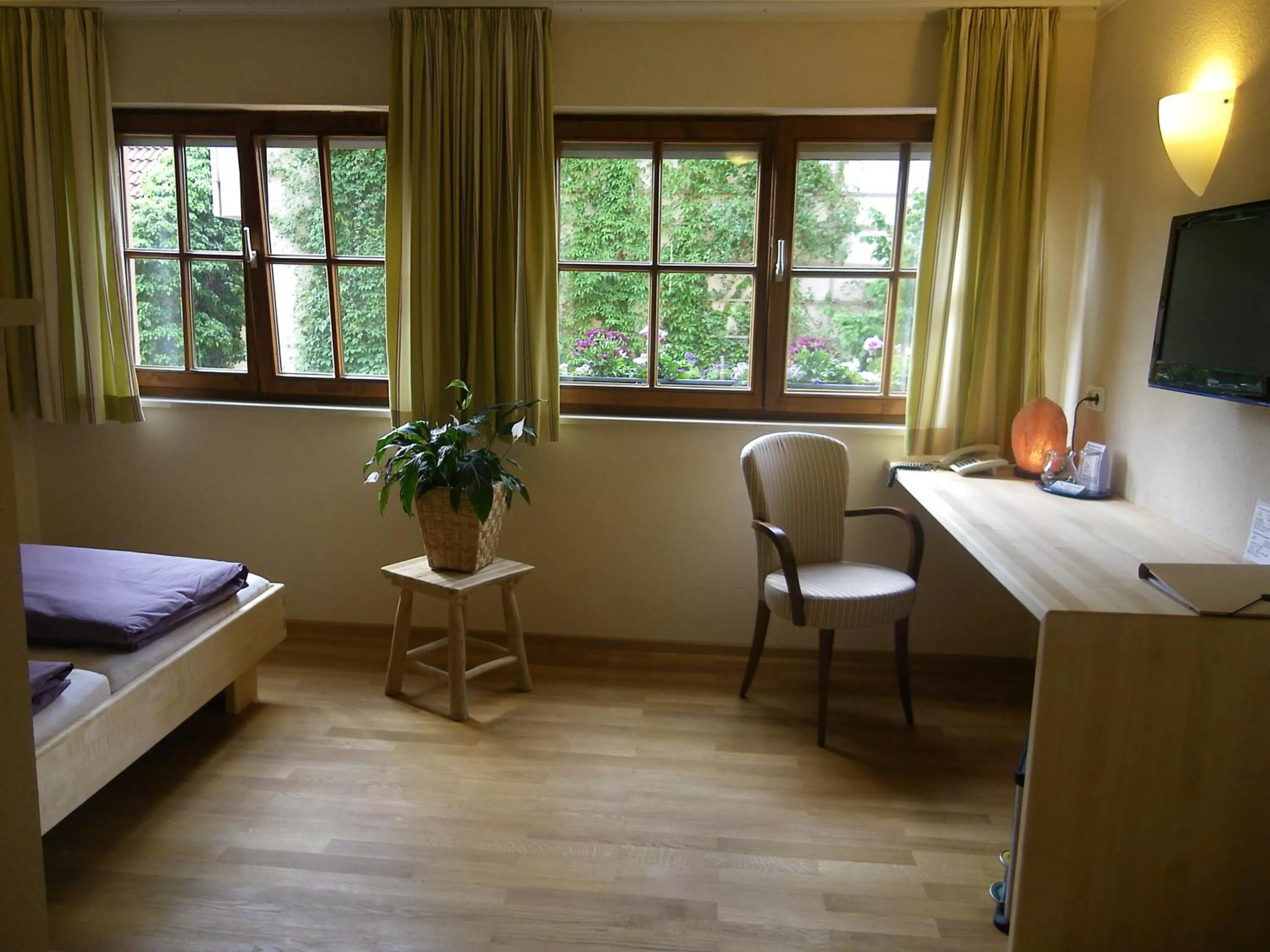Photo of the whole room, Bed in BIO Hotel Bayerischer Wirt Augsburg
