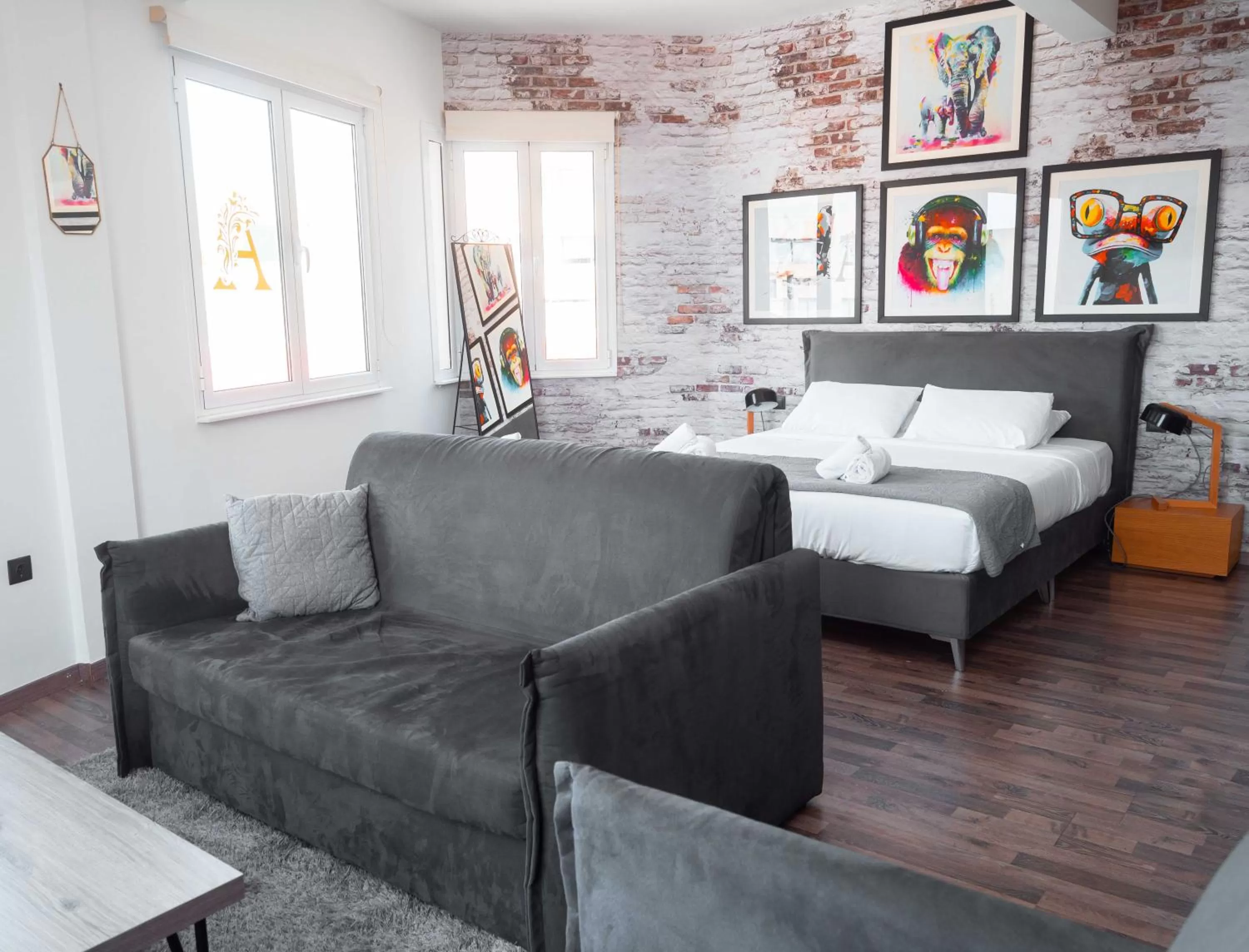 Living room, Bed in The Athens Version Luxury Suites