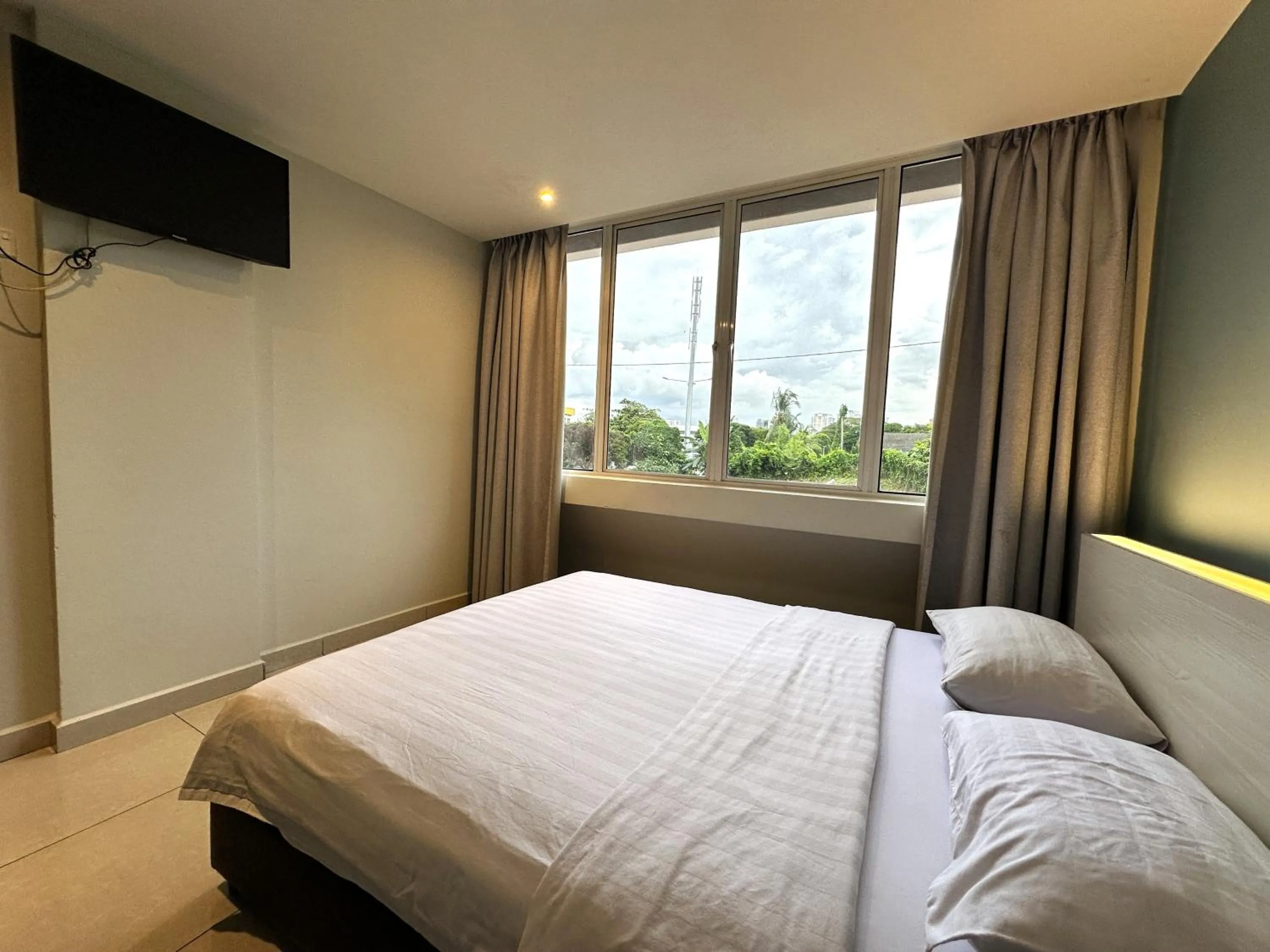 Bed in De UPTOWN Hotel @ P.J. 222