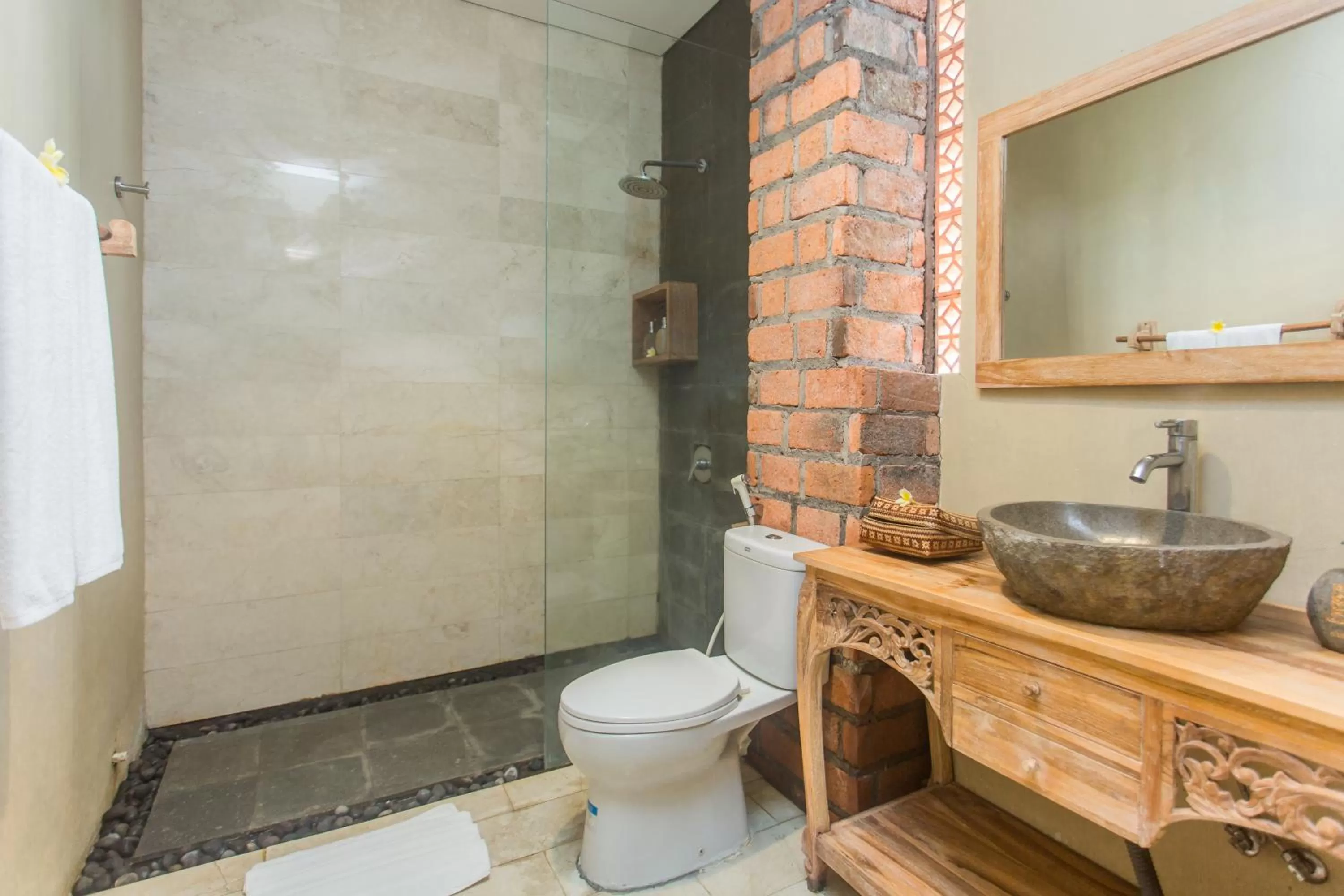 Bathroom in Kailash Suites by GenuineHost