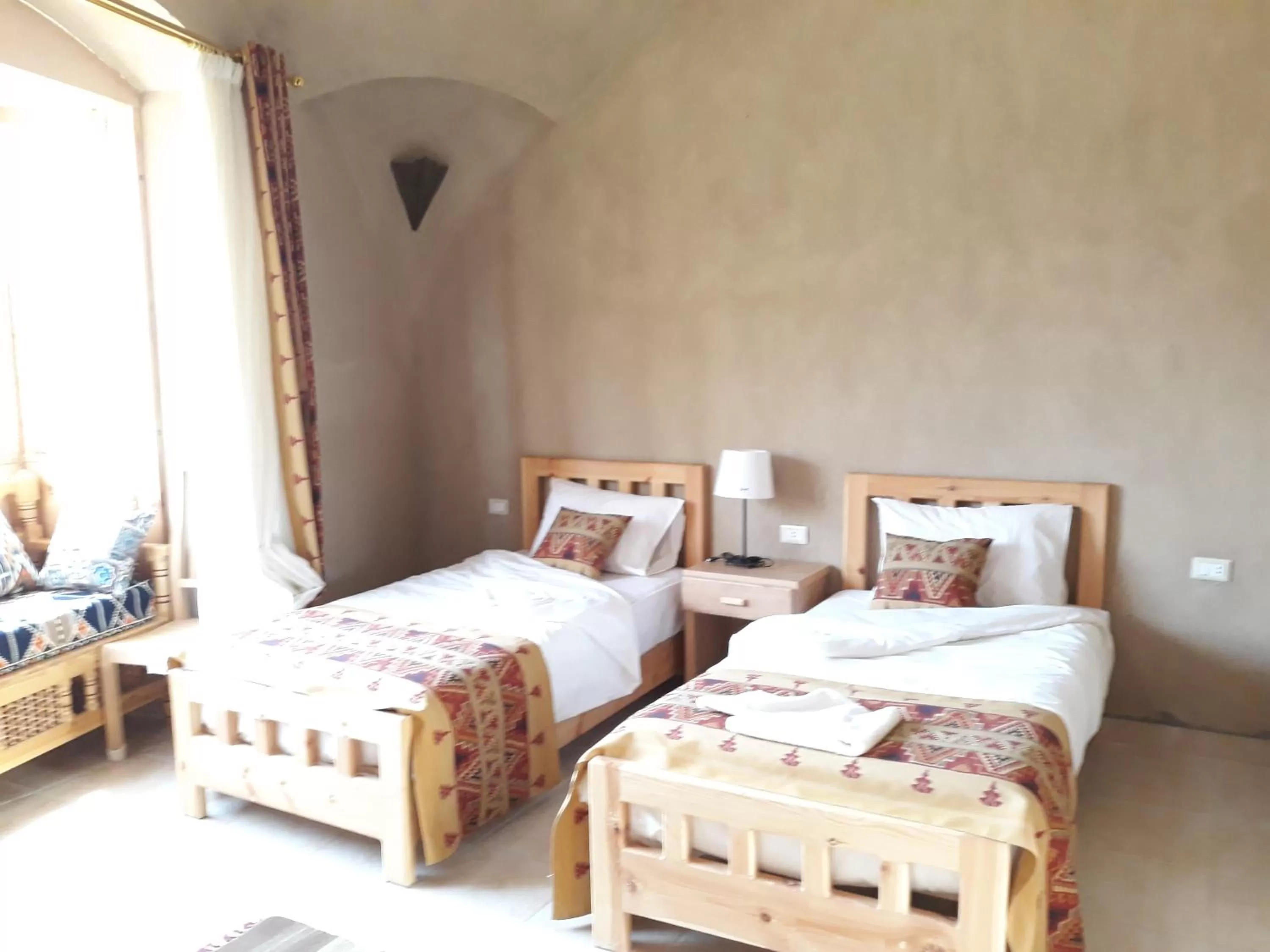 Bed in Embrace Hotel