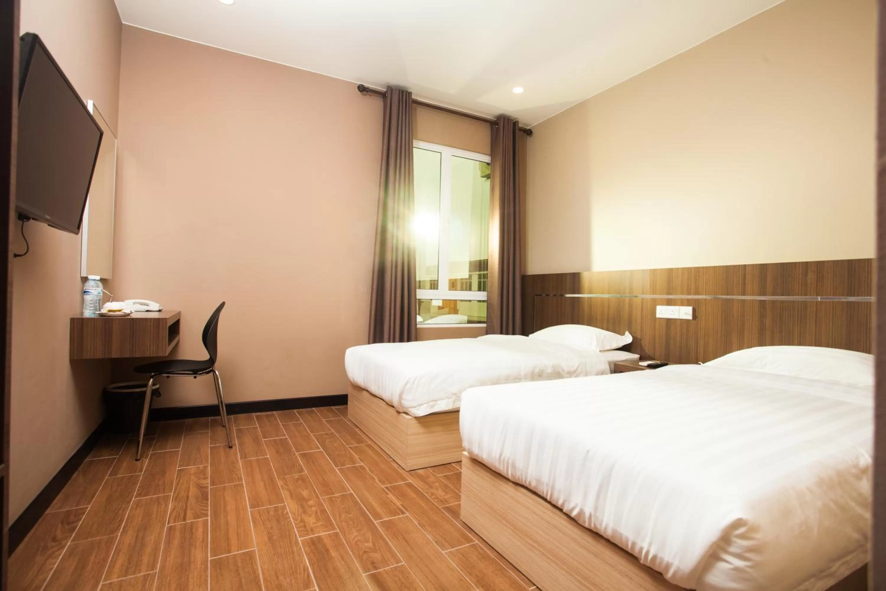 Bed in Friendly Hotel