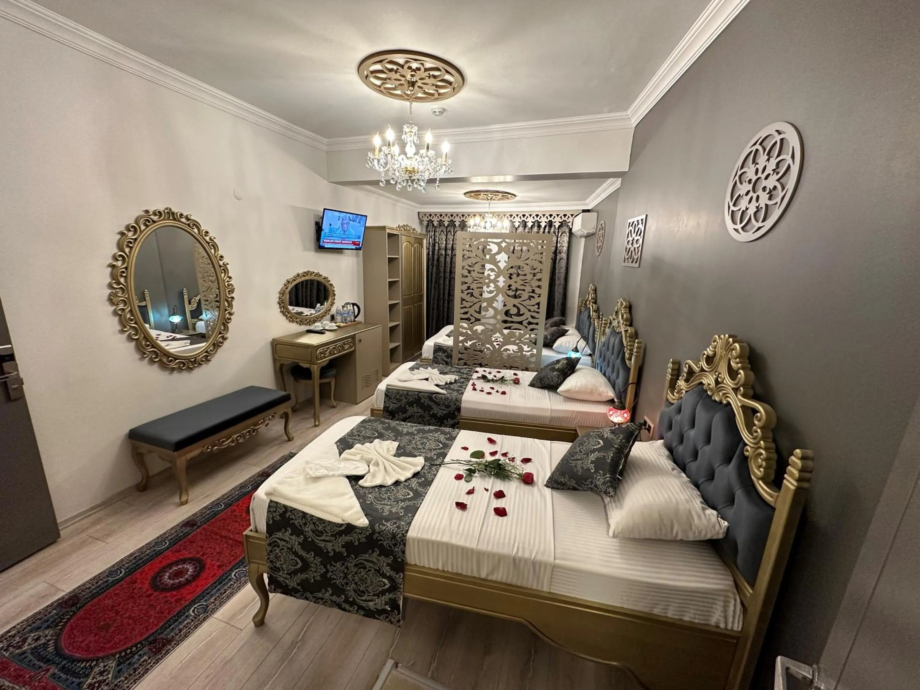 Bed in Ethnica Suites