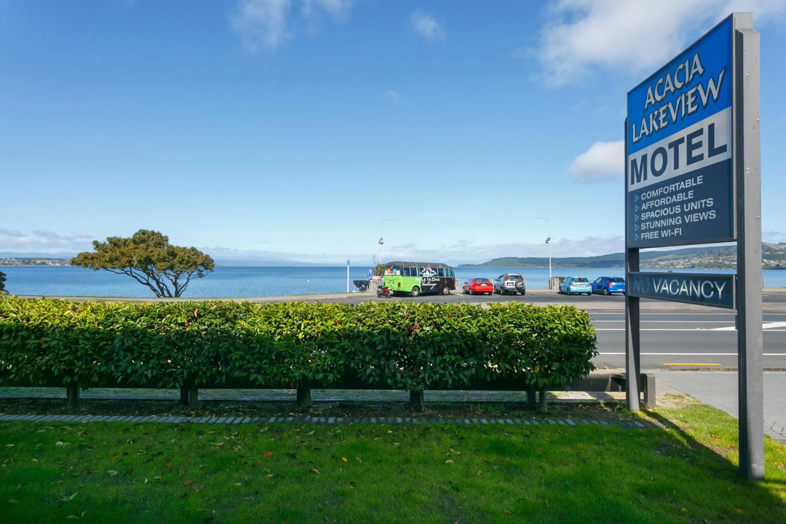 Property logo or sign in Acacia Lake View Motel