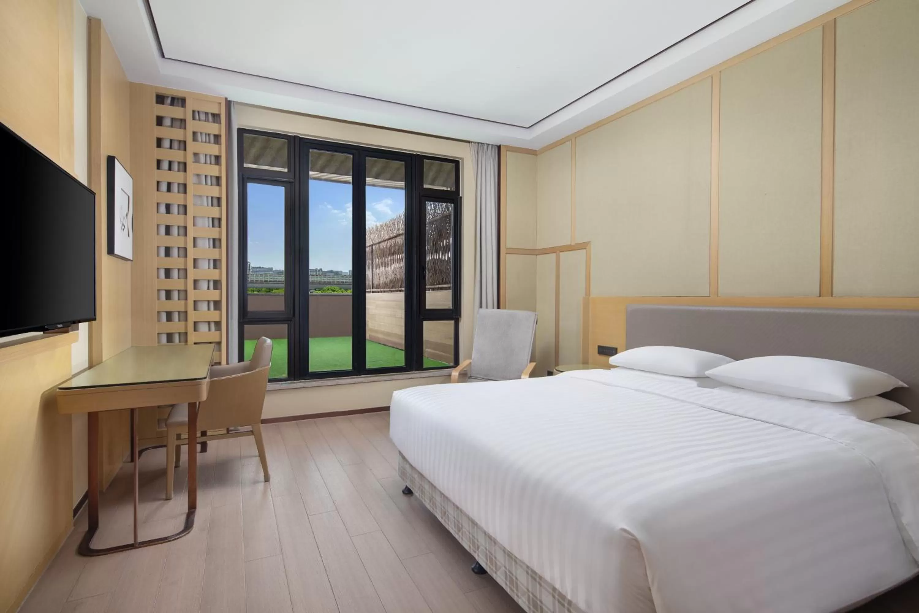 Bed in Courtyard by Marriott Shanghai International Tourism and Resorts Zone