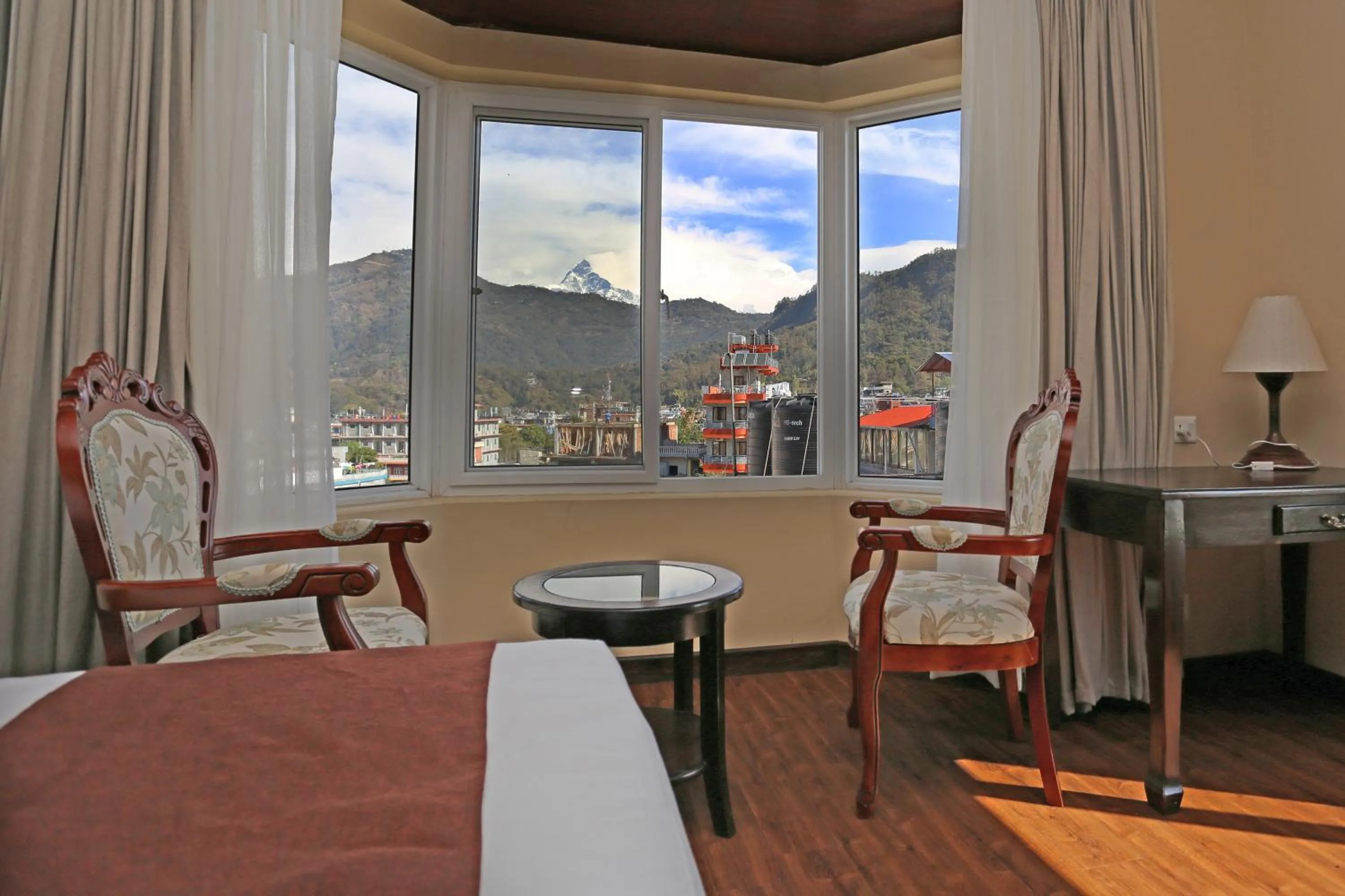 Seating area, Mountain View in Da Yatra Courtyard Hotel