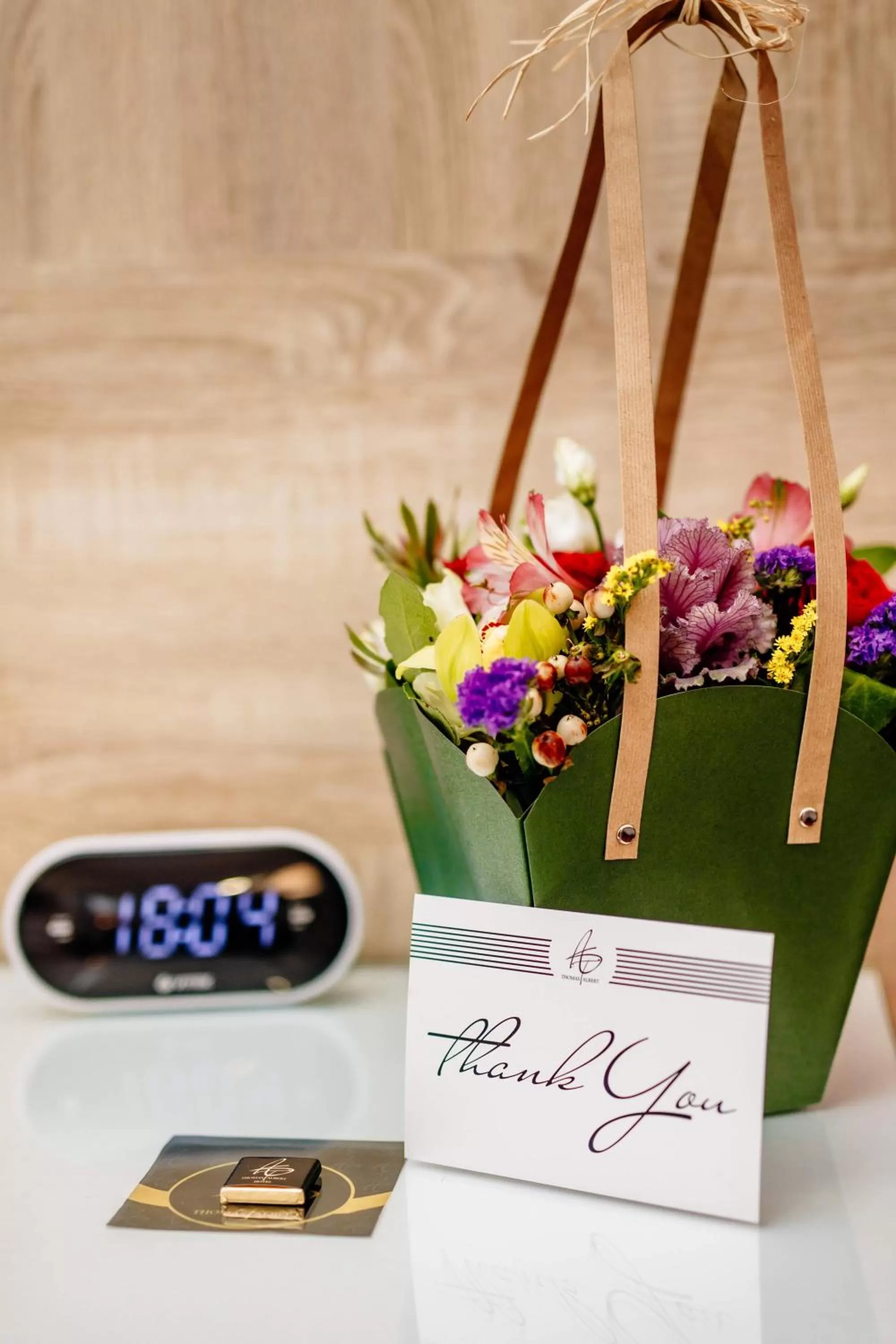 Property logo or sign in Thomas Albert Hotel