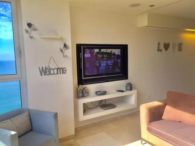 Living room, TV/Entertainment Center in Raphael Apartments